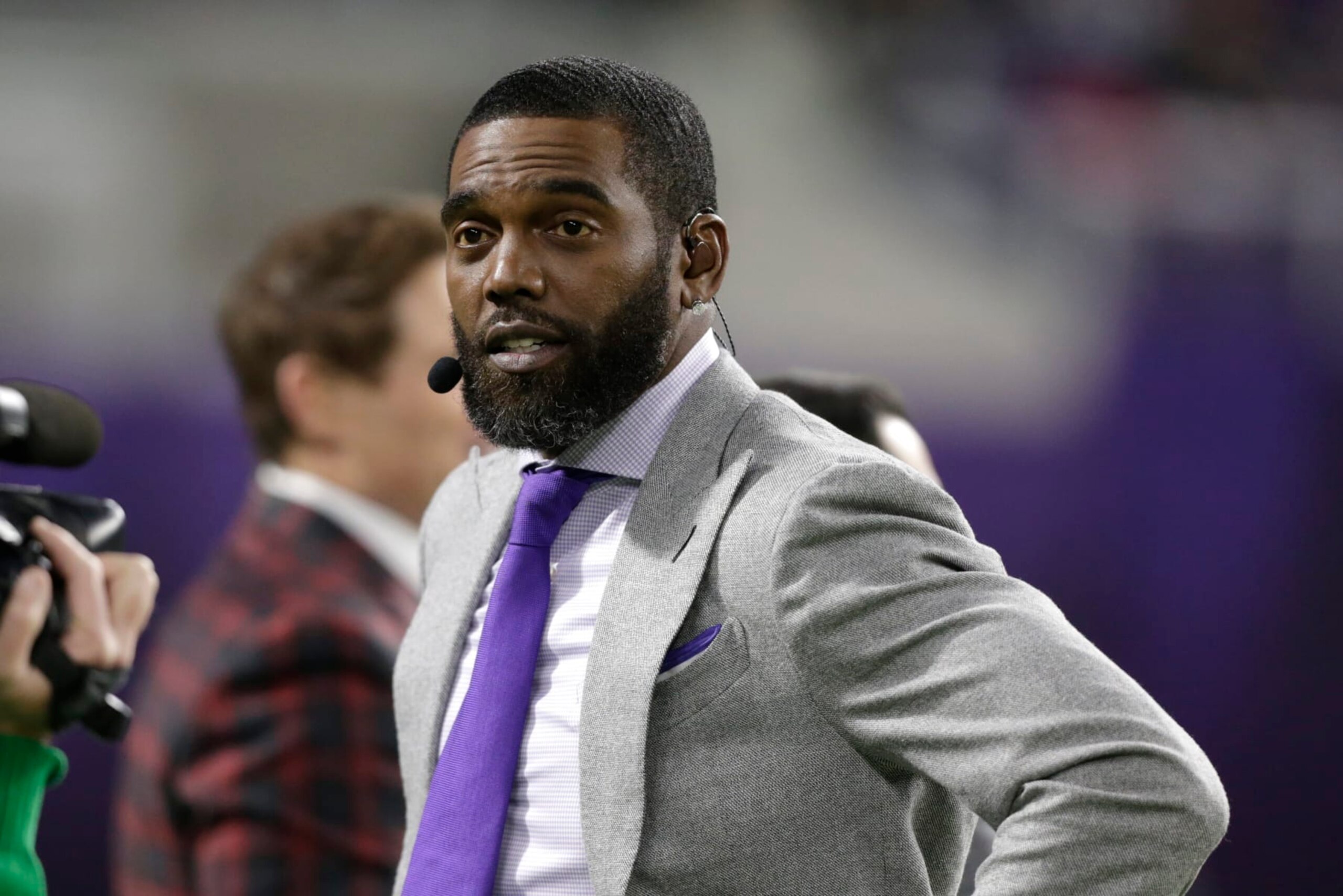 ESPN Monday Night Countdown personality Randy Moss stands on the field before an NFL football game between the Minnesota Vikings and the Green Bay Packers, Monday, Dec. 23, 2019, in Minneapolis. (AP Photo/Andy Clayton-King) ESPN Monday Night Countdown personality Randy Moss stands on the field before an NFL football game between the Minnesota Vikings and the Green Bay Packers, Monday, Dec. 23, 2019, in Minneapolis. (AP Photo/Andy Clayton-King)