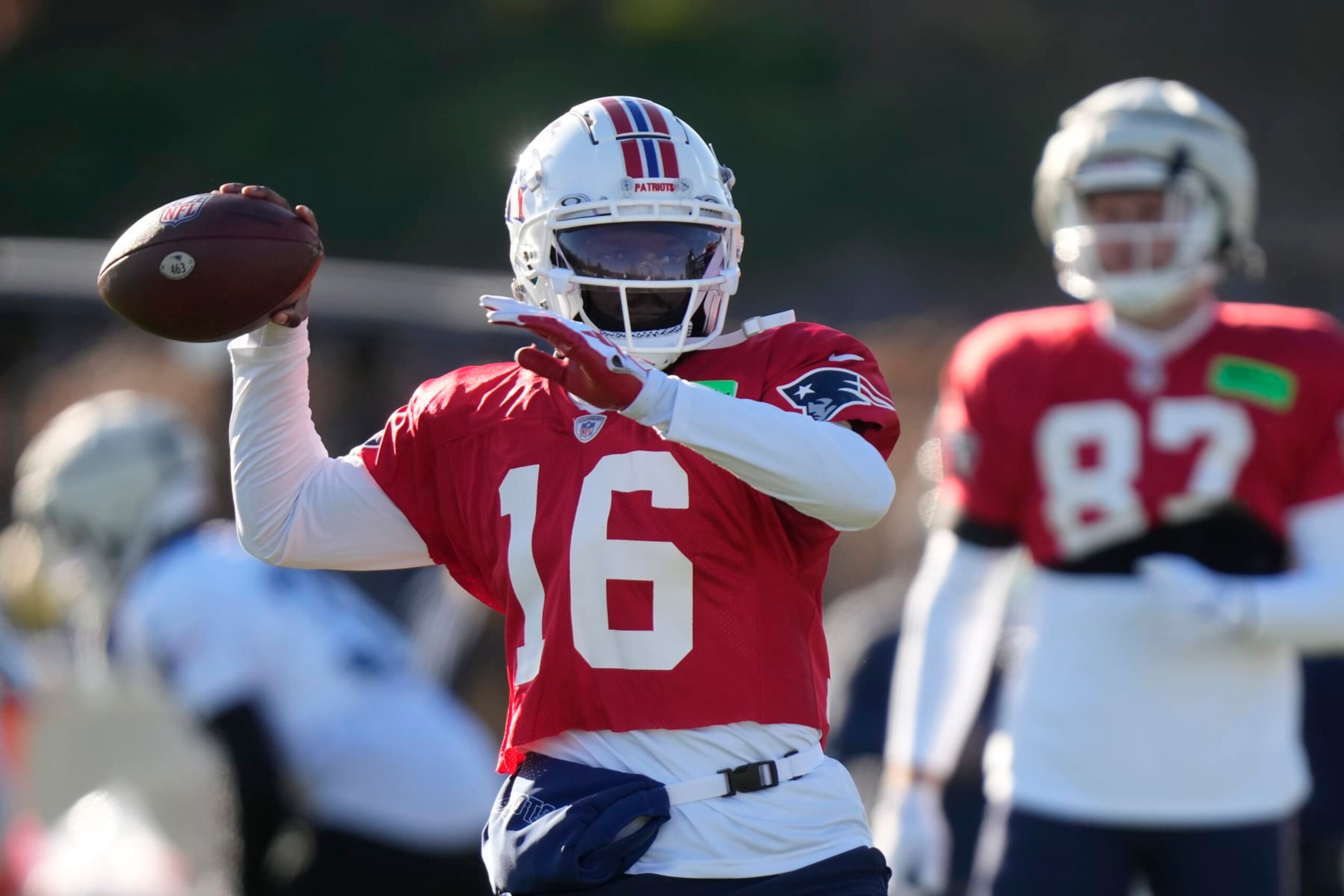 New England Patriots quarterback Malik Cunningham (16) winds up to throw a pass during an NFL football practice, Wednesday, Nov. 29, 2023, in Foxborough, Mass. (AP Photo/Steven Senne)