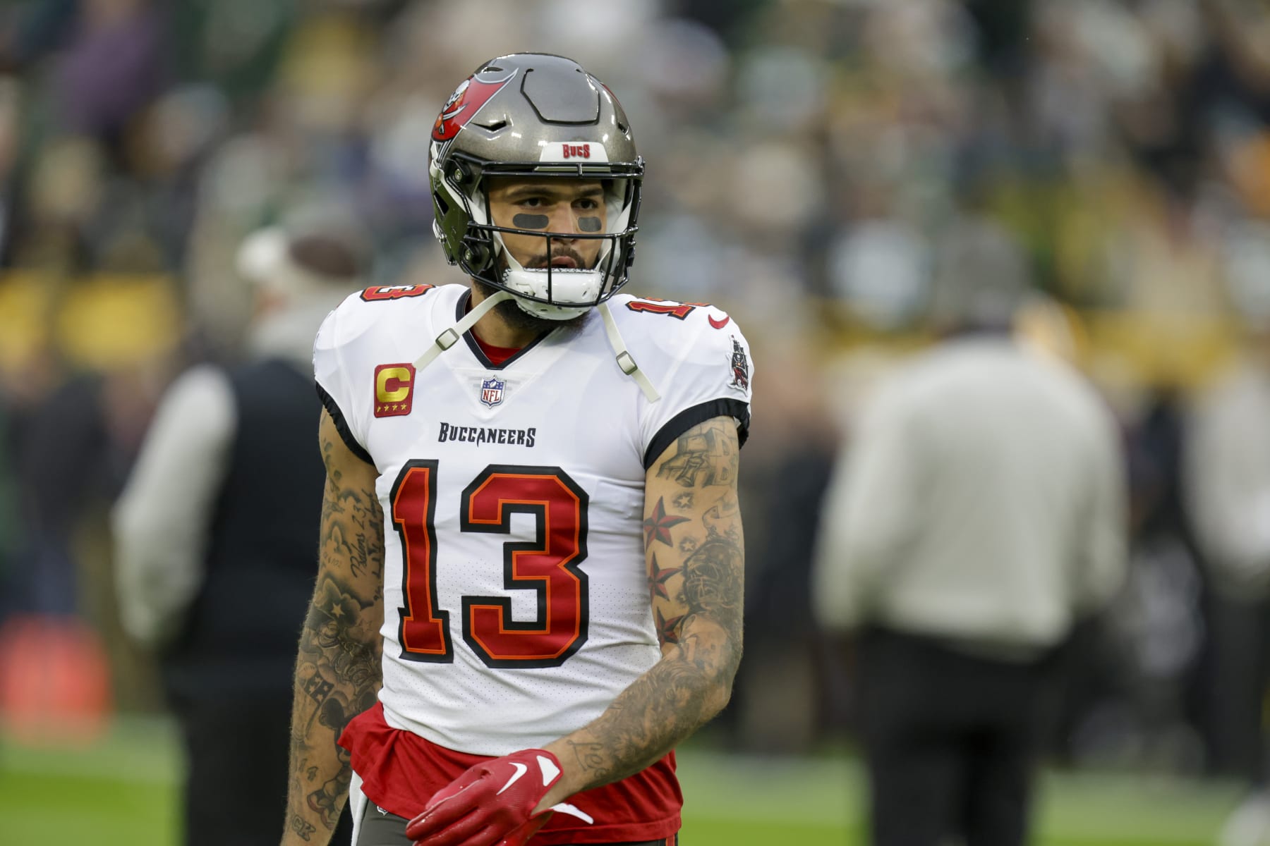 Tampa Bay Buccaneers wide receiver Mike Evans (13) warms up before an NFL football game between the Green Bay Packers and Tampa Bay Buccaneers Sunday, Dec. 17, 2023, in Green Bay, Wis. (AP Photo/Matt Ludtke)