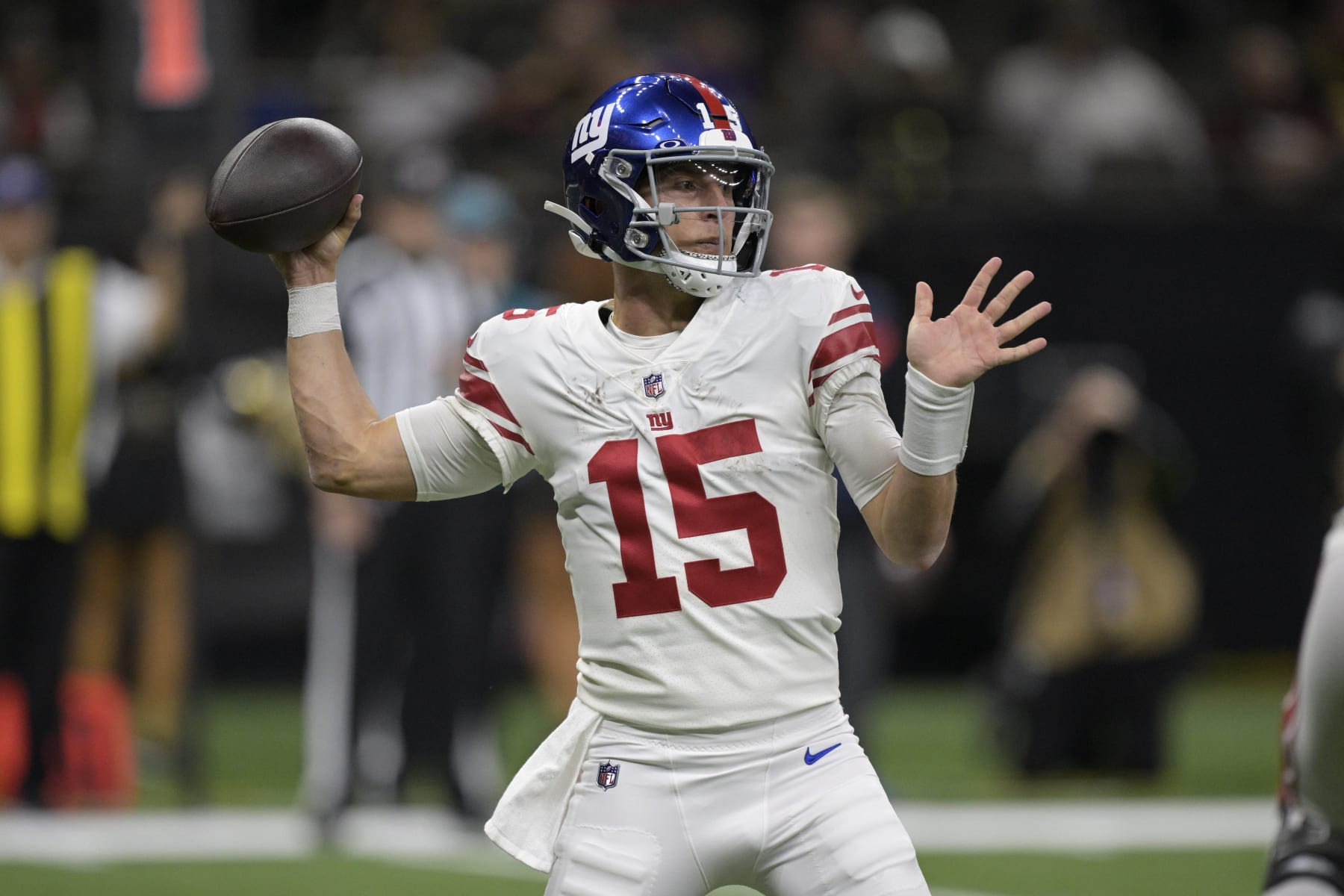 New York Giants quarterback Tommy DeVito (15) throws during an NFL football game against the New Orleans Saints in New Orleans, Sunday, Dec. 17, 2023. (AP Photo/Matthew Hinton)