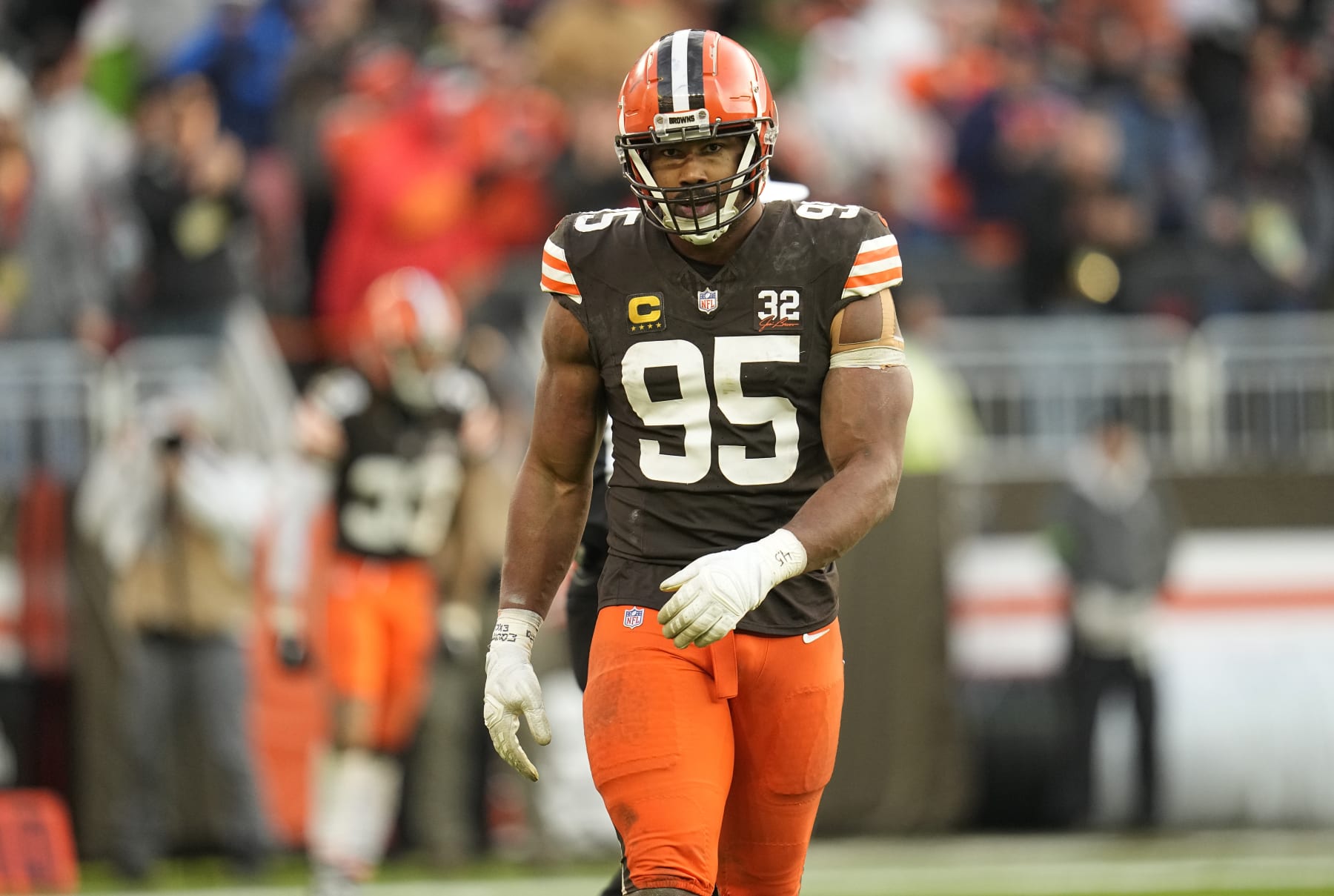 Cleveland Browns defensive end Myles Garrett (95) walks off the field after a tackle in the second half of an NFL football game against the Chicago Bears in Cleveland, Sunday, Dec. 17, 2023. (AP Photo/Sue Ogrocki)