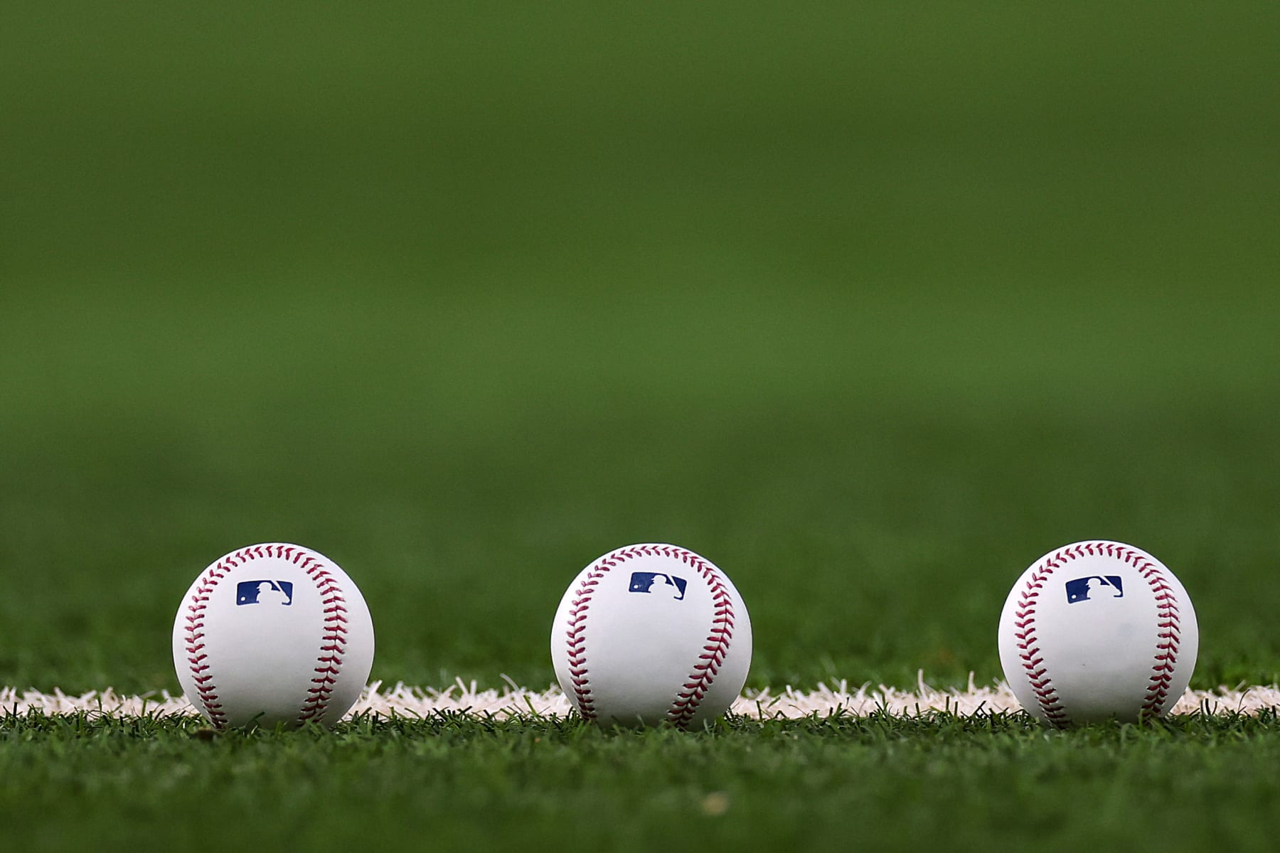 ARLINGTON, TEXAS - OCTOBER 20: Three baseballs are seen prior to Game Five of the American League Championship Series between the Texas Rangers and the Houston Astros at Globe Life Field on October 20, 2023 in Arlington, Texas. (Photo by Stacy Revere/Getty Images)