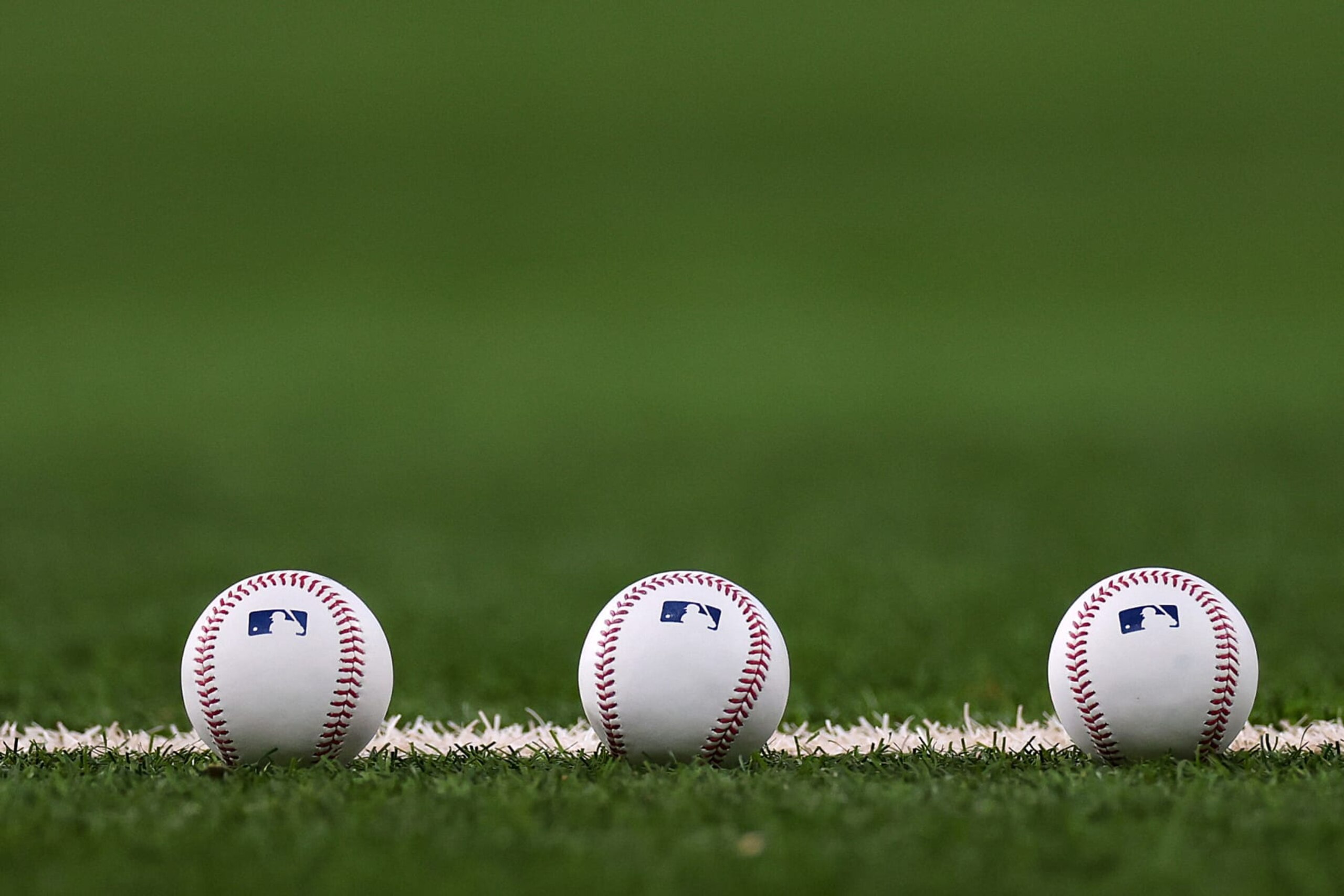ARLINGTON, TEXAS - OCTOBER 20: Three baseballs are seen prior to Game Five of the American League Championship Series between the Texas Rangers and the Houston Astros at Globe Life Field on October 20, 2023 in Arlington, Texas. (Photo by Stacy Revere/Getty Images)