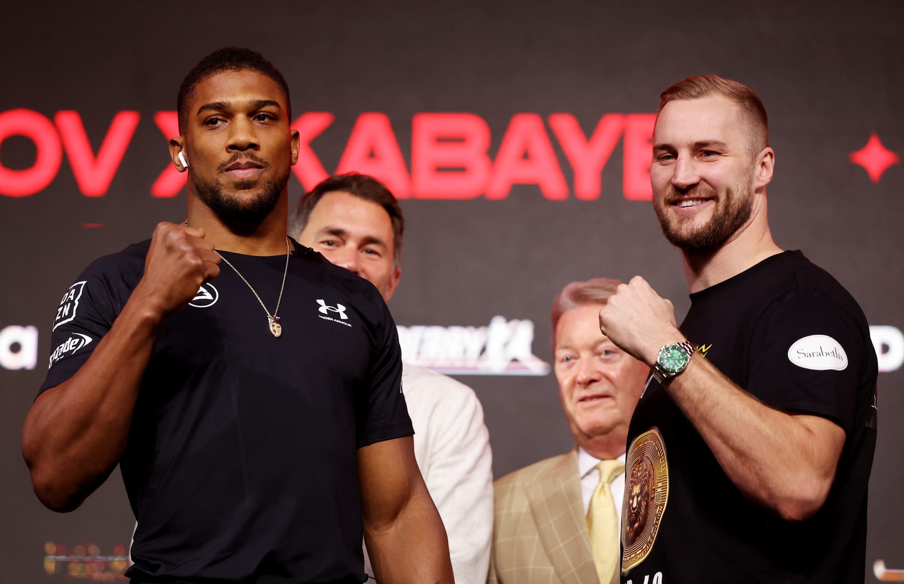RIYADH, SAUDI ARABIA - DECEMBER 21: Anthony Joshua and Otto Wallin pose for a photo as they are presented by Promotor Eddie Hearn, Chairman of Matchroom Sport, and Manager and Promoter Frank Warren, Co-Owner of Queensberry Promotions, during the press conference ahead of the Heavyweight fight between Anthony Joshua and Otto Wallin during the Day of Reckoning card at Press Arena, Kingdom Arena on December 21, 2023 in Riyadh, Saudi Arabia. (Photo by Richard Pelham/Getty Images)