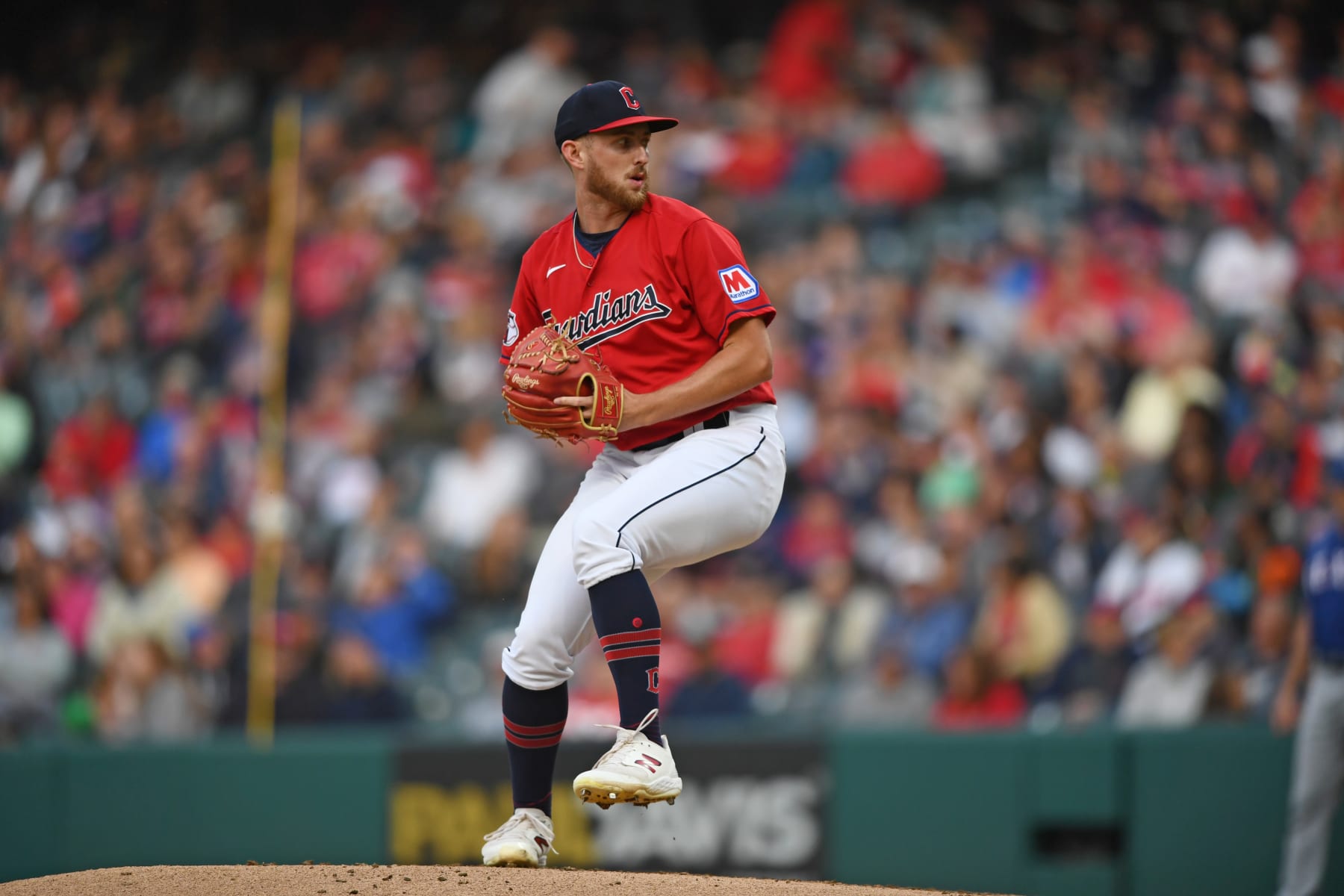 CLEVELAND, OHIO - SEPTEMBER 16, 2023: Tanner Bibee #61 of the Cleveland Guardians throws a pitch during the fourth inning against the Texas Rangers at Progressive Field on September 16, 2023 in Cleveland, Ohio. (Photo by George Kubas/Diamond Images via Getty Images)