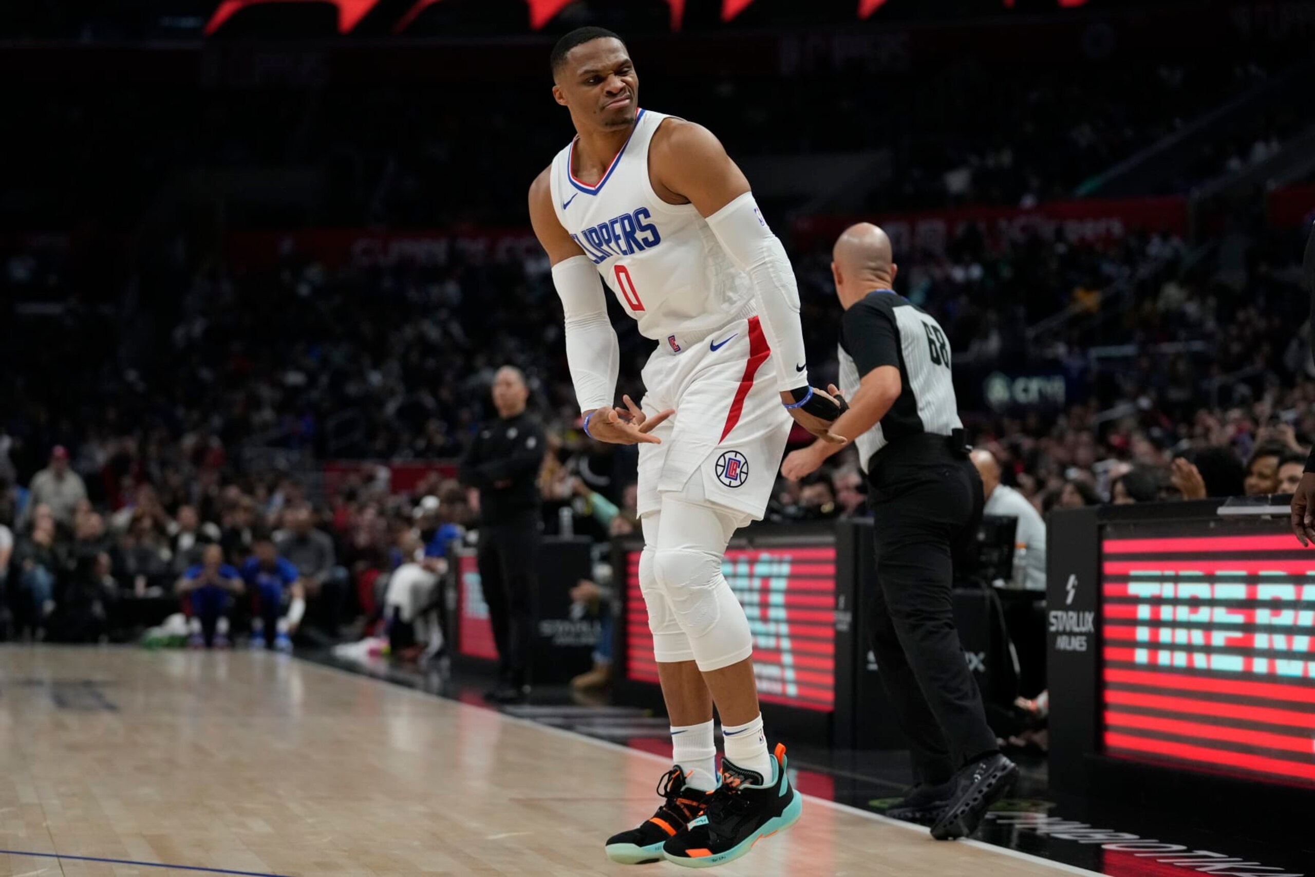 Los Angeles Clippers guard Russell Westbrook reacts after a 3-pointer during the second half of an NBA basketball game against the Portland Trail Blazers in Los Angeles, Monday, Dec. 11, 2023. (AP Photo/Ashley Landis)