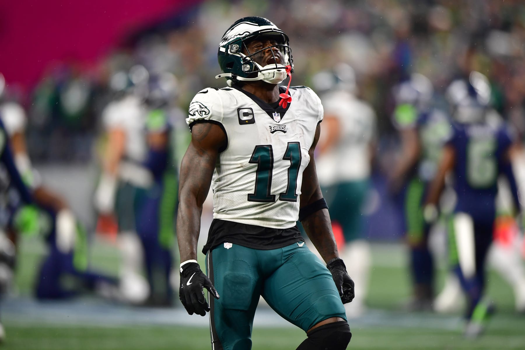 SEATTLE, WASHINGTON - DECEMBER 18: A.J. Brown #11 of the Philadelphia Eagles celebrates in the second half at Lumen Field on December 18, 2023 in Seattle, Washington. (Photo by Jane Gershovich/Getty Images)