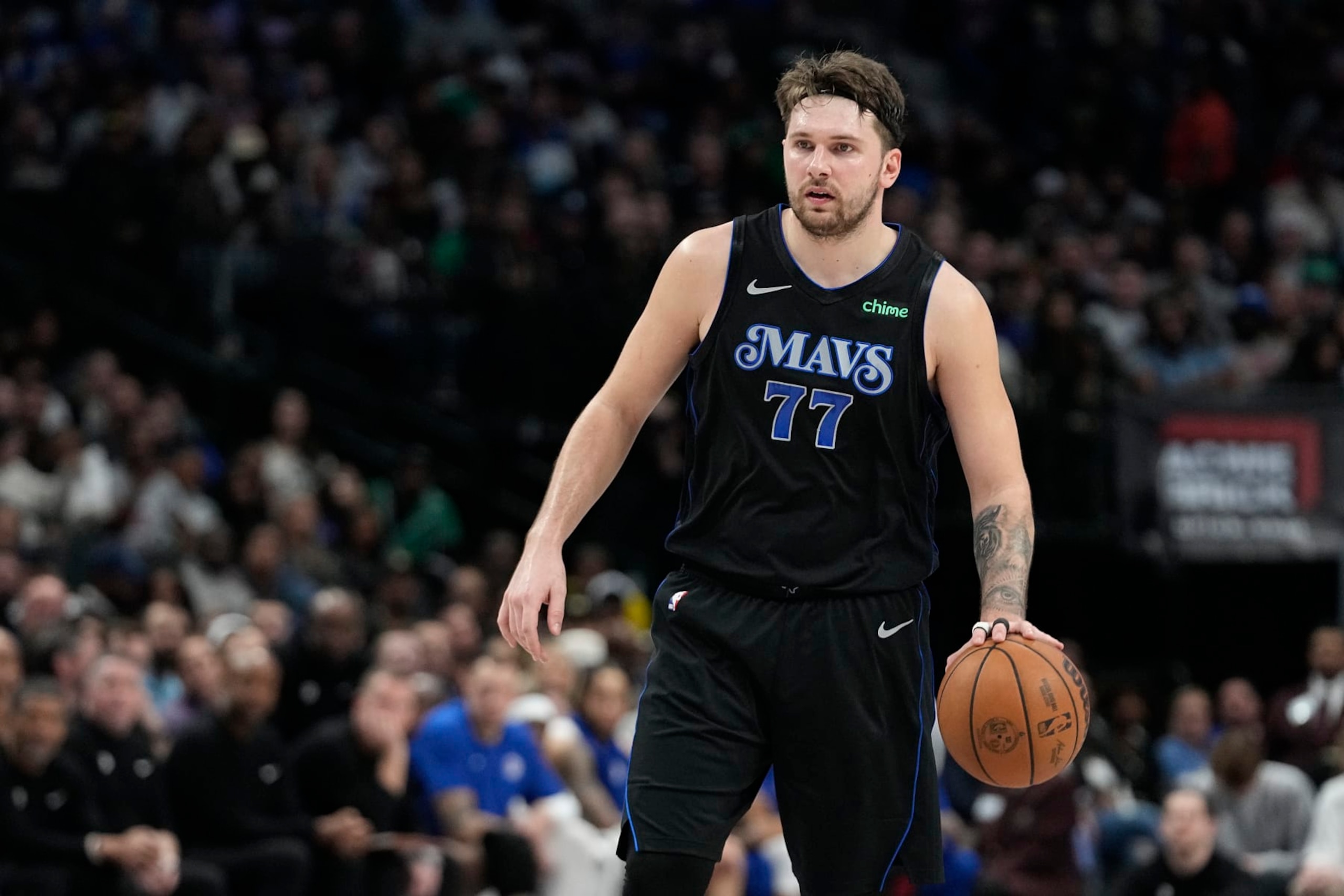 Dallas Mavericks guard Luka Doncic dribbles during an NBA basketball game against the Los Angeles Clippers in Dallas, Wednesday, Dec. 20, 2023. (AP Photo/LM Otero)