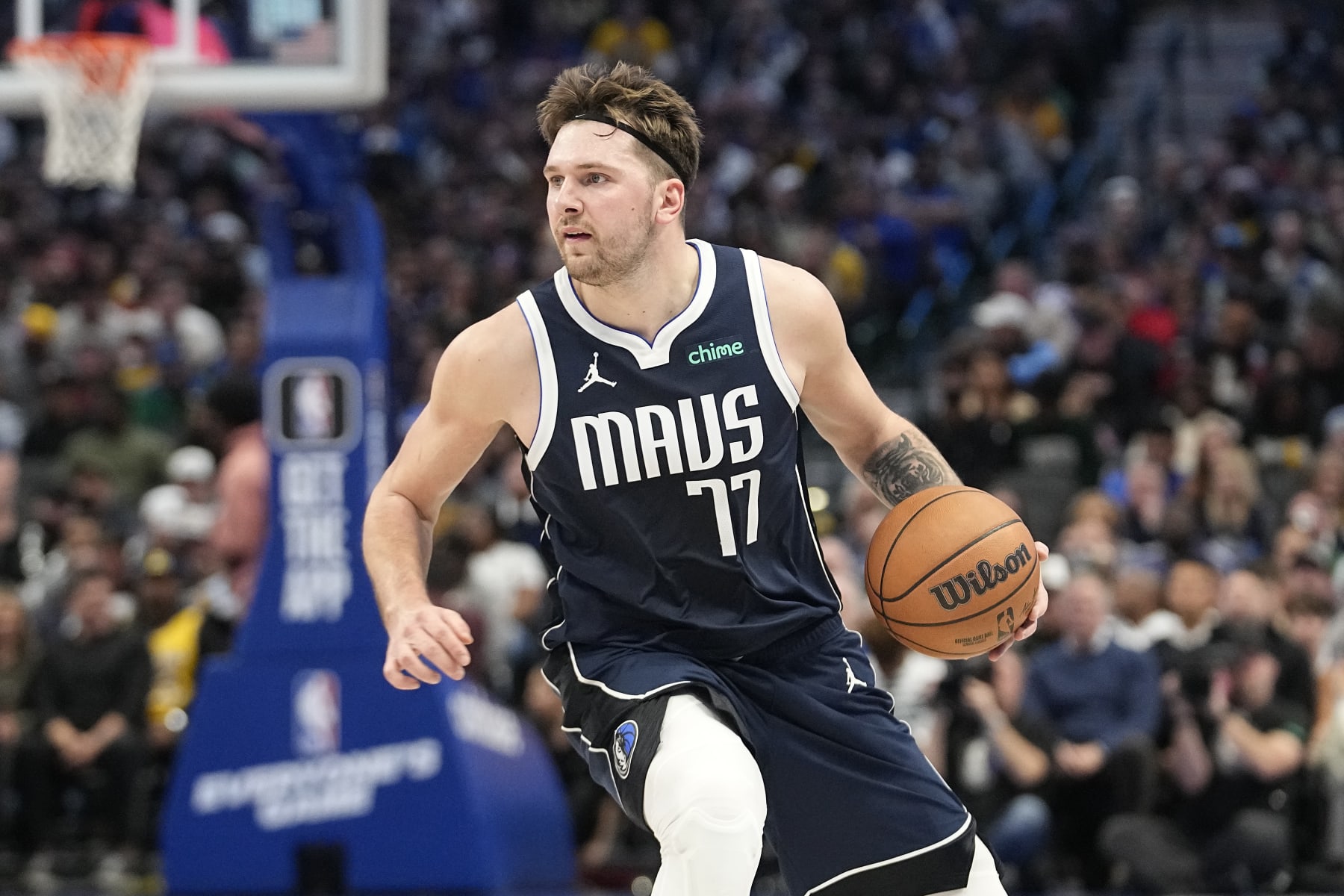 Dallas Mavericks guard Luka Doncic dribles during the first half of an NBA basketball game against the Los Angeles Lakers in Dallas, Tuesday, Dec. 12, 2023. (AP Photo/LM Otero)
