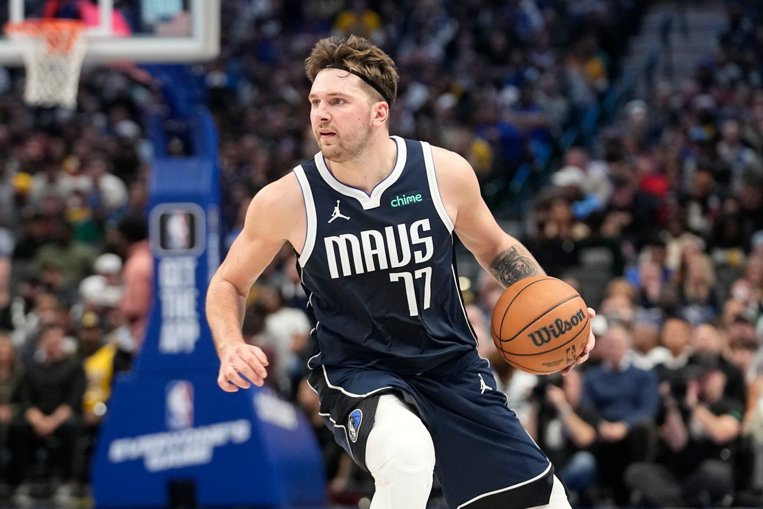 Dallas Mavericks guard Luka Doncic dribles during the first half of an NBA basketball game against the Los Angeles Lakers in Dallas, Tuesday, Dec. 12, 2023. (AP Photo/LM Otero)