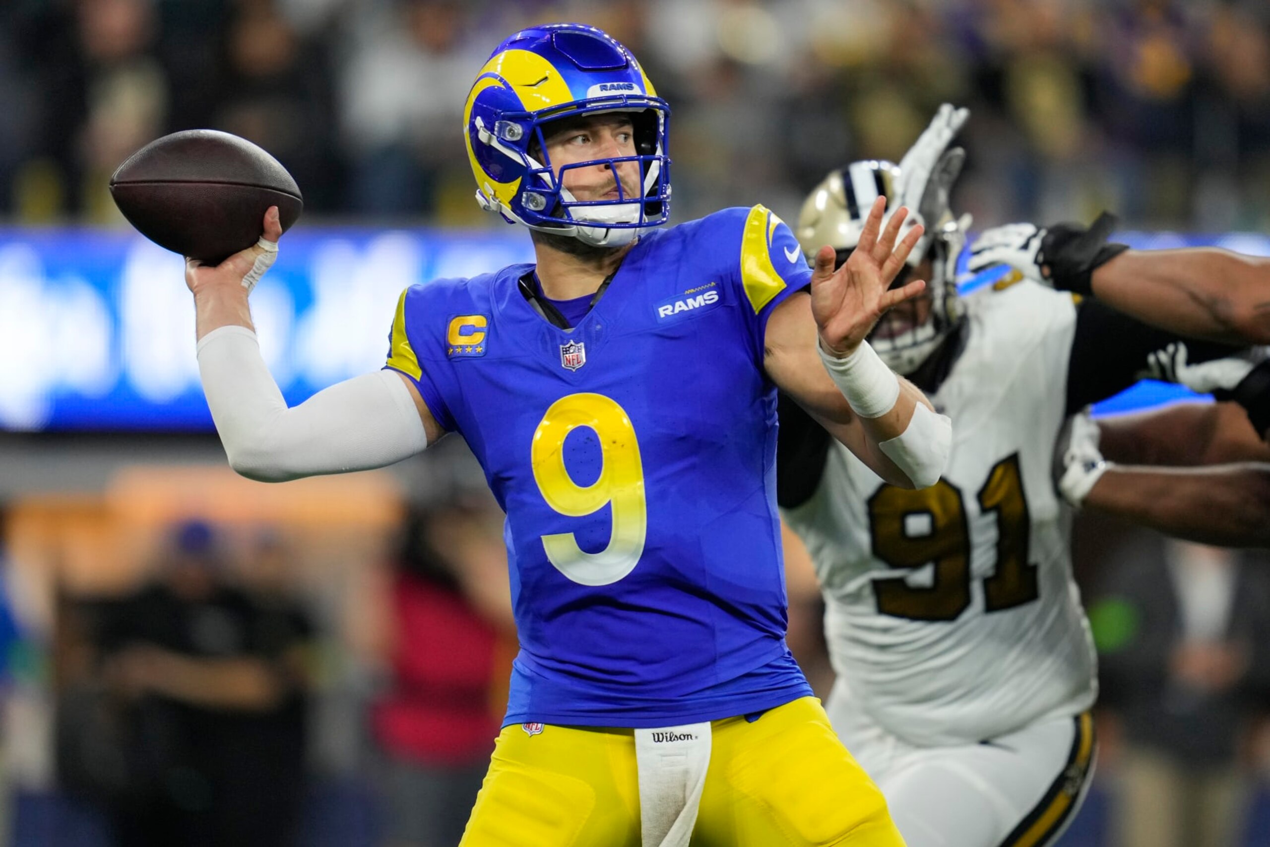 Los Angeles Rams quarterback Matthew Stafford (9) throws a pass against the New Orleans Saints during the second half of an NFL football game Thursday, Dec. 21, 2023, in Inglewood, Calif. (AP Photo/Ashley Landis)