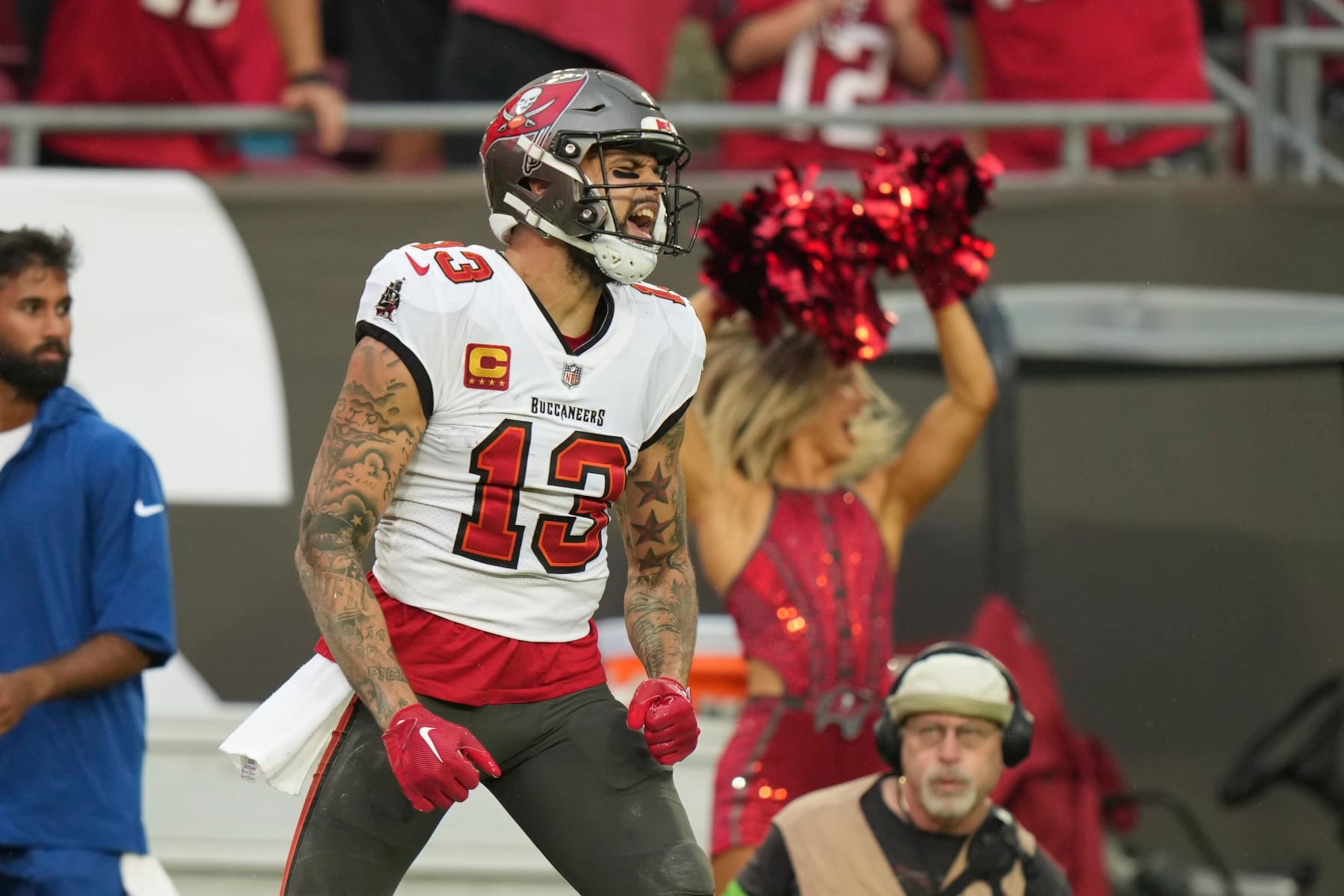 Tampa Bay Buccaneers wide receiver Mike Evans (13) celebrates after a deep catch for a big gain during an NFL football game against the Carolina Panthers, Sunday, Dec. 3, 2023, in Tampa, Fla. (AP Photo/Peter Joneleit)