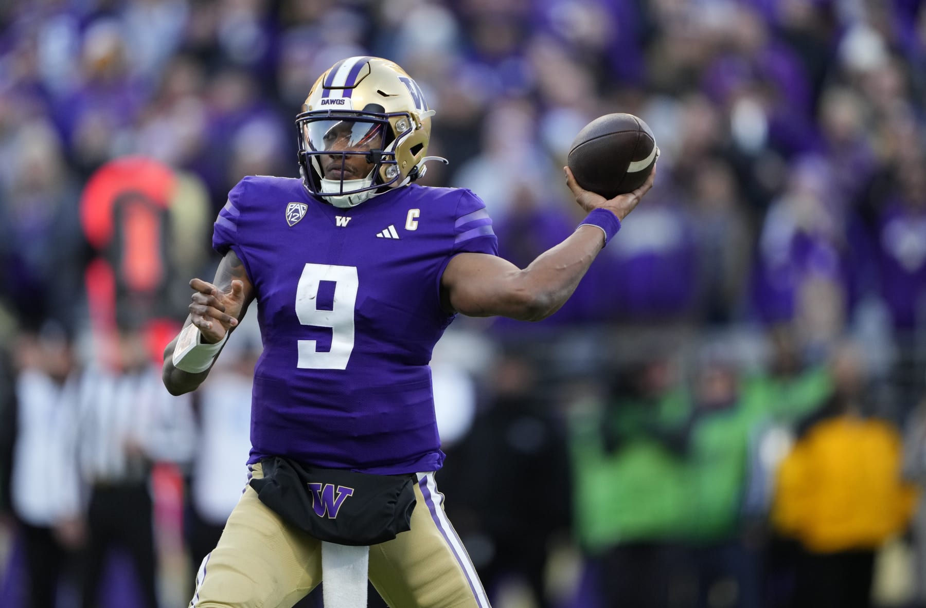 Washington quarterback Michael Penix Jr. (9) throws against Washington State during the second half of an NCAA college football game Saturday, Nov. 25, 2023, in Seattle. Washington won 24-21. (AP Photo/Lindsey Wasson)