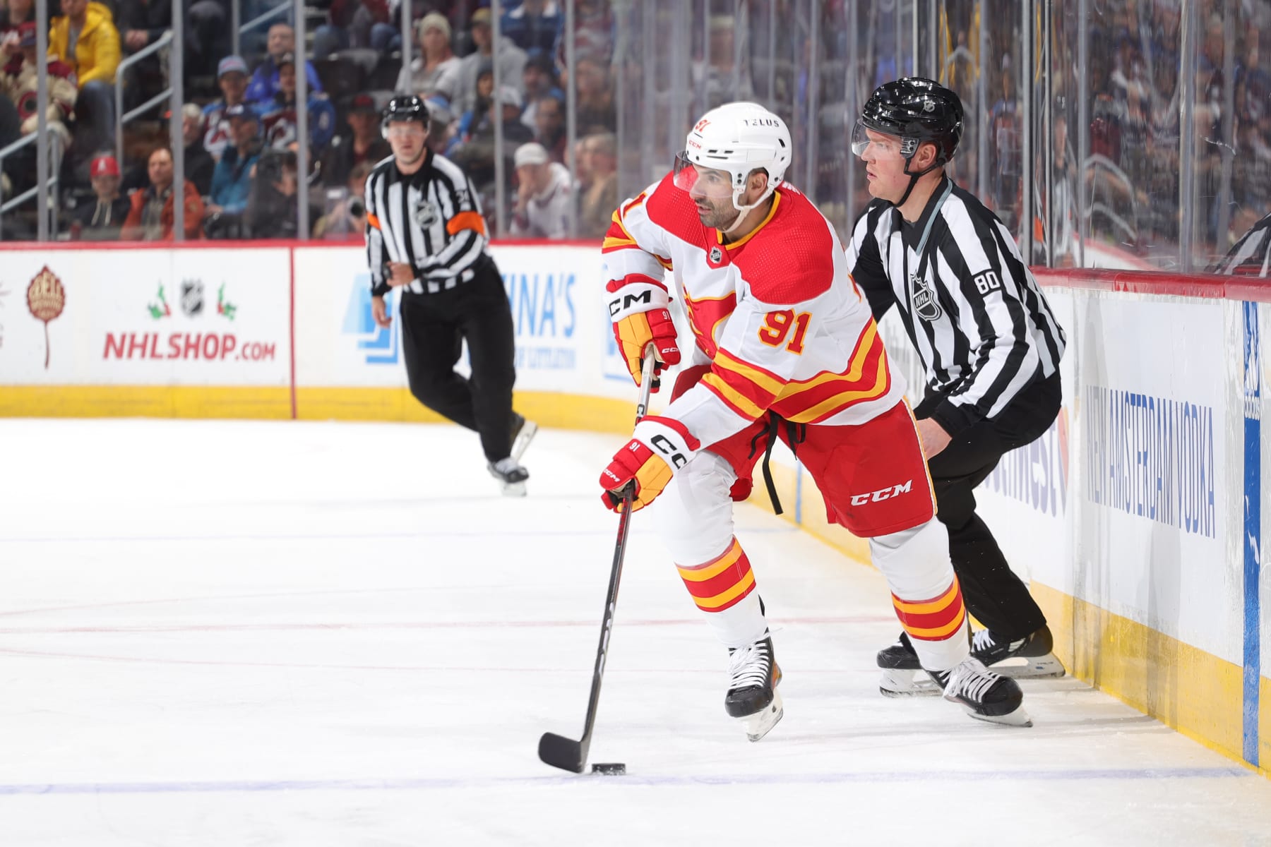 DENVER, COLORADO - DECEMBER 11: Nazem Kadri #91 of the Calgary Flames skates against the Colorado Avalanche at Ball Arena on December 11, 2023 in Denver, Colorado. (Photo by Michael Martin/NHLI via Getty Images)