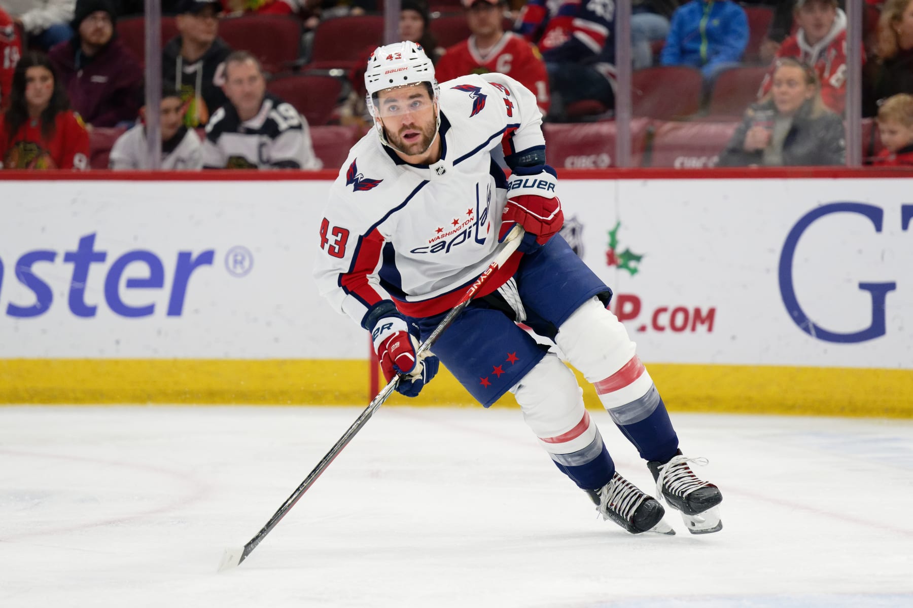 CHICAGO, ILLINOIS - DECEMBER 10:  Tom Wilson #43 of the Washington Capitals skates against the Chicago Blackhawks on December 10, 2023 at United Center in Chicago, Illinois.  (Photo by Jamie Sabau/Getty Images)