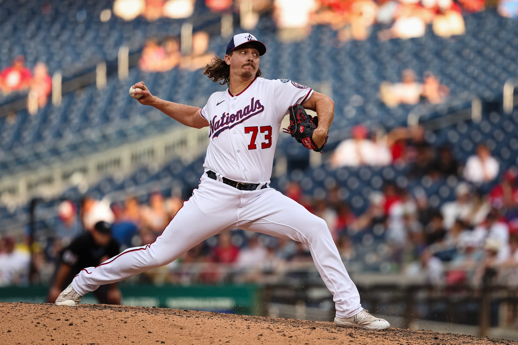 WASHINGTON, DC - AUGUST 17: Hunter Harvey #73 of the Washington Nationals pitches against the Boston Red Sox during the eighth inning at Nationals Park on August 17, 2023 in Washington, DC. (Photo by Scott Taetsch/Getty Images)