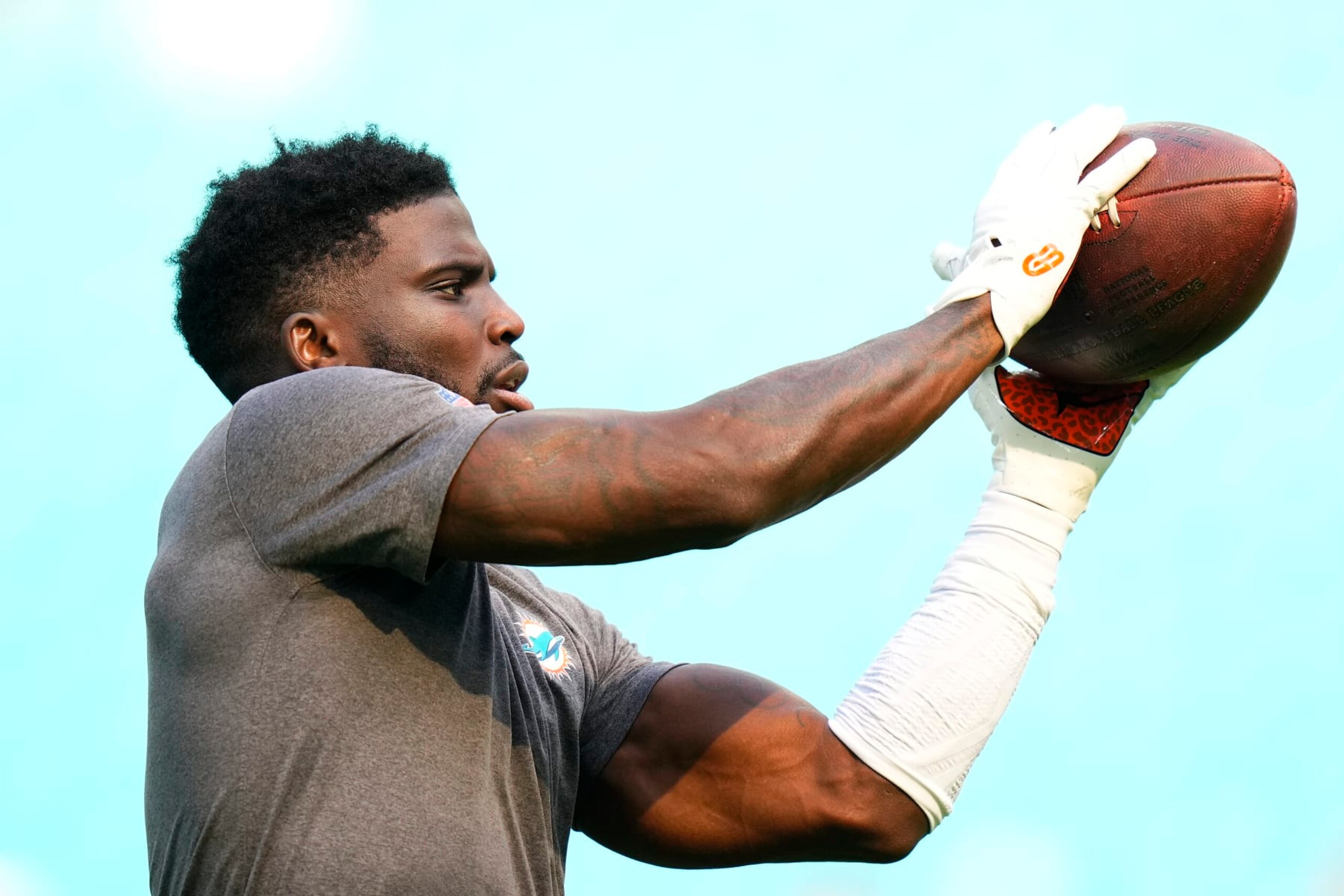 MIAMI GARDENS, FLORIDA - DECEMBER 17: Tyreek Hill #10 of the Miami Dolphins warms up prior to a game against the New York Jets at Hard Rock Stadium on December 17, 2023 in Miami Gardens, Florida. (Photo by Rich Storry/Getty Images)