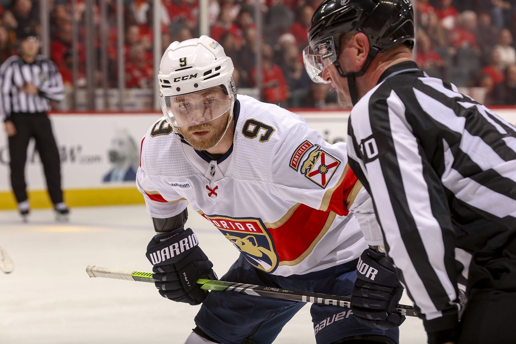 CALGARY, AB - DECEMBER 18: Sam Bennett #9 of the Florida Panthers prepares to face off against the Calgary Flames at Scotiabank Saddledome on December 18, 2023 in Calgary, Alberta, Canada. (Photo by Gerry Thomas/NHLI via Getty Images)