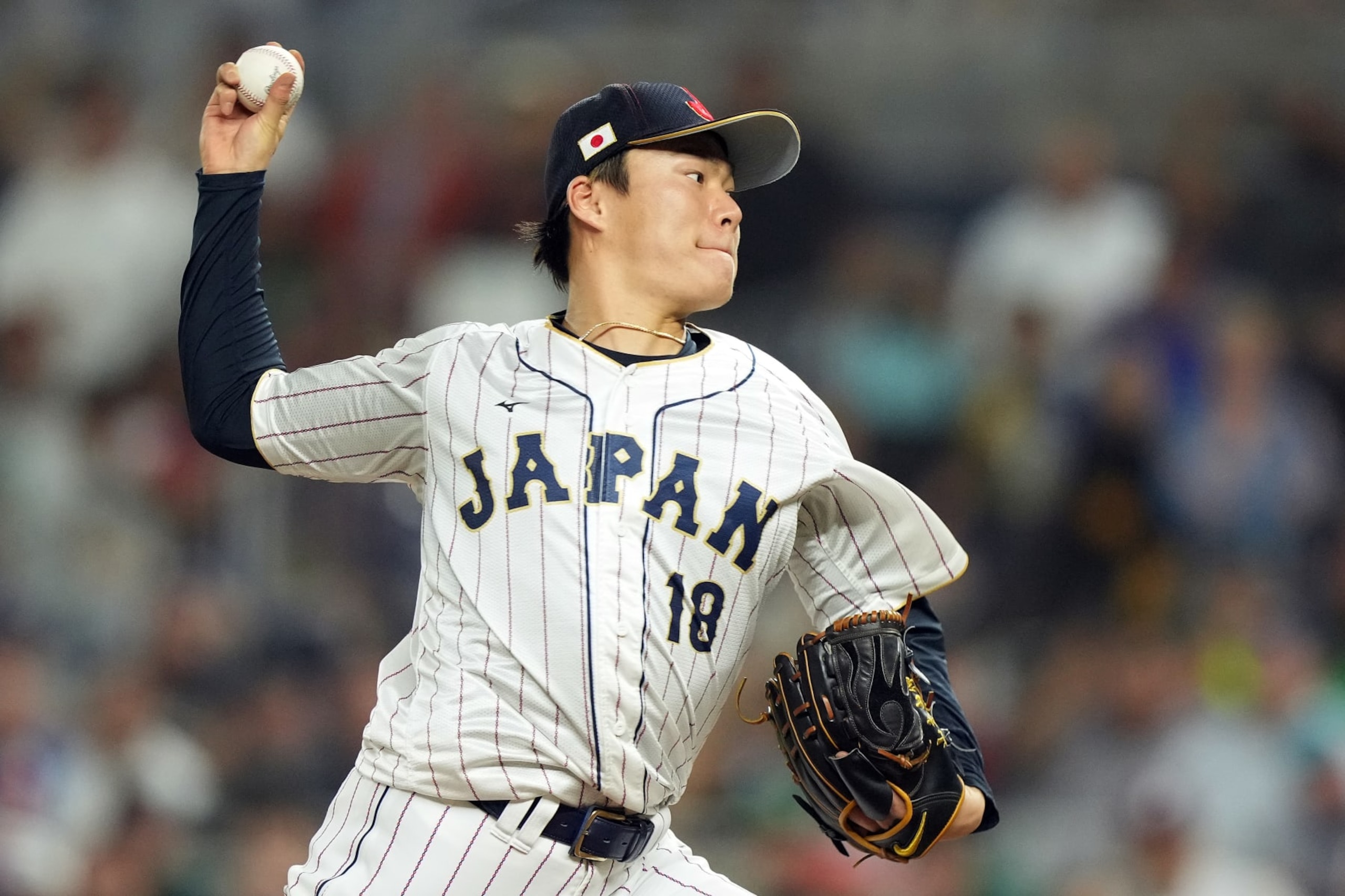 MIAMI, FLORIDA - MARCH 20: Yoshinobu Yamamoto #18 of Team Japan pitches in the eighth inning against Team Mexico during the World Baseball Classic Semifinals at loanDepot park on March 20, 2023 in Miami, Florida. (Photo by Eric Espada/Getty Images) MIAMI, FLORIDA - MARCH 20: Yoshinobu Yamamoto #18 of Team Japan pitches in the eighth inning against Team Mexico during the World Baseball Classic Semifinals at loanDepot park on March 20, 2023 in Miami, Florida. (Photo by Eric Espada/Getty Images)