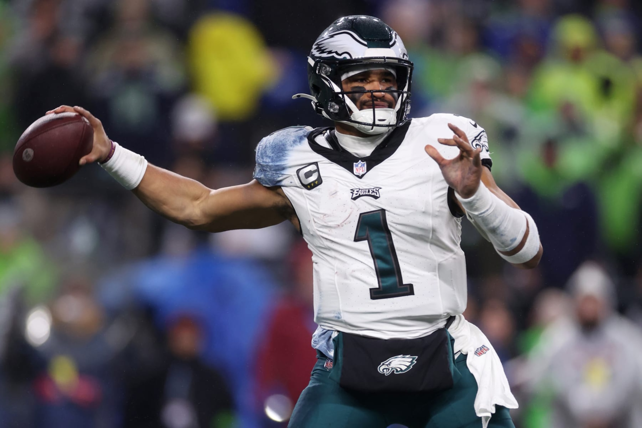 SEATTLE, WASHINGTON - DECEMBER 18: Jalen Hurts #1 of the Philadelphia Eagles looks to pass in the first half at Lumen Field on December 18, 2023 in Seattle, Washington. (Photo by Steph Chambers/Getty Images)