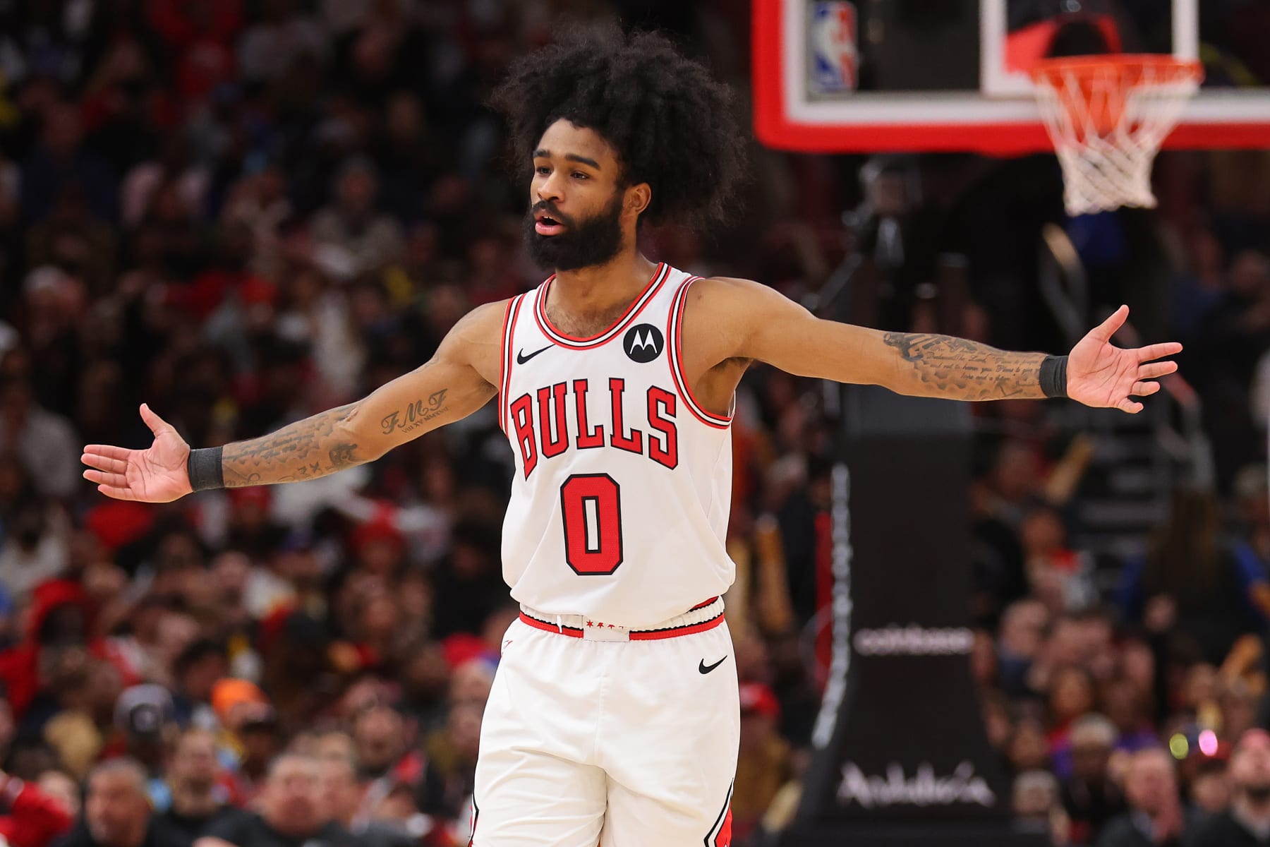 CHICAGO, ILLINOIS - DECEMBER 20: Coby White #0 of the Chicago Bulls celebrates a three pointer against the Los Angeles Lakers during the second half at the United Center on December 20, 2023 in Chicago, Illinois. NOTE TO USER: User expressly acknowledges and agrees that, by downloading and or using this photograph, User is consenting to the terms and conditions of the Getty Images License Agreement.  (Photo by Michael Reaves/Getty Images)