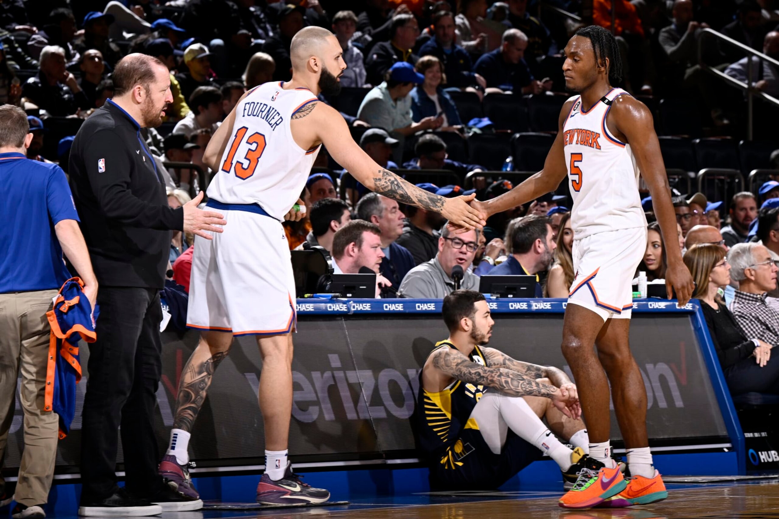 NEW YORK, NY - APRIL 9: Evan Fournier #13 of the New York Knicks high fives Immanuel Quickley #5 of the New York Knicks during the game against the Indiana Pacers on April 9, 2023 at Madison Square Garden in New York City, New York. NOTE TO USER: User expressly acknowledges and agrees that, by downloading and or using this photograph, User is consenting to the terms and conditions of the Getty Images License Agreement. Mandatory Copyright Notice: Copyright 2023 NBAE  (Photo by David Dow/NBAE via Getty Images)