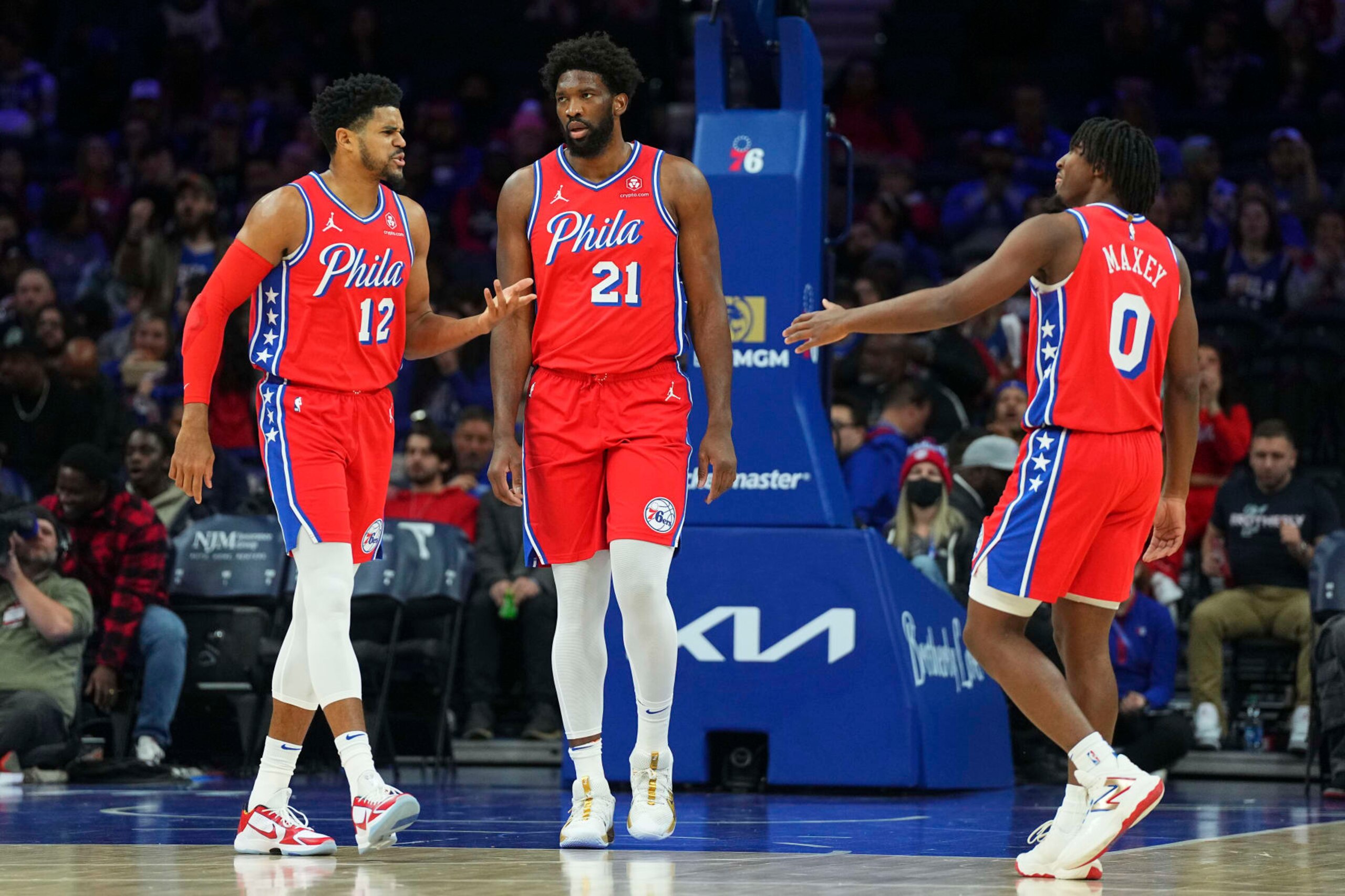 PHILADELPHIA, PENNSYLVANIA - DECEMBER 8: Tobias Harris #12, Joel Embiid #21, and Tyrese Maxey #0 of the Philadelphia 76ers in action against the Atlanta Hawks at the Wells Fargo Center on December 8, 2023 in Philadelphia, Pennsylvania. NOTE TO USER: User expressly acknowledges and agrees that, by downloading and or using this photograph, User is consenting to the terms and conditions of the Getty Images License Agreement. (Photo by Mitchell Leff/Getty Images)