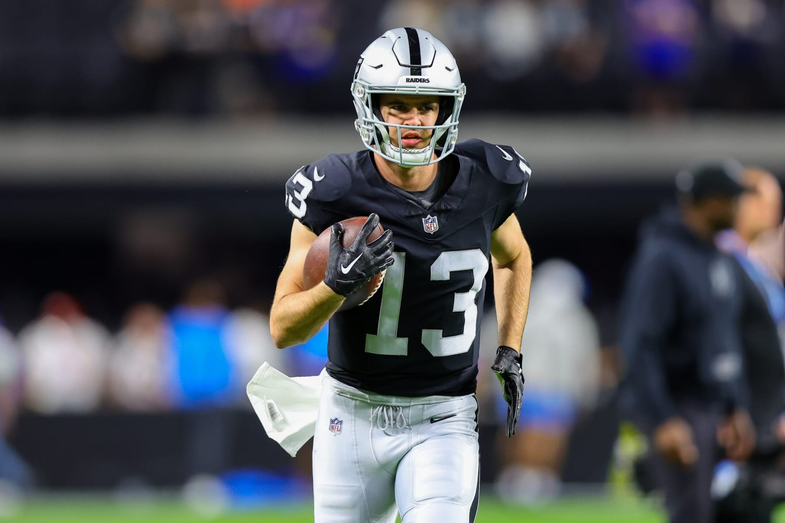 LAS VEGAS, NV - DECEMBER 14: Las Vegas Raiders wide receiver Hunter Renfrow (13) warms up before the Los Angeles Chargers vs Las Vegas Raiders game on December 14, 2023, at Allegiant Stadium in Las Vegas, NV. (Photo by Jordon Kelly/Icon Sportswire via Getty Images)