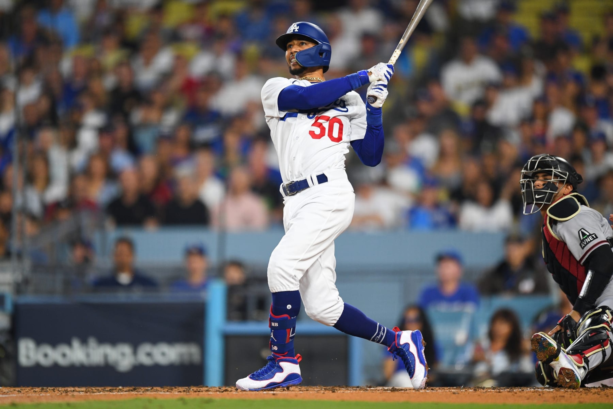 LOS ANGELES, CA - OCTOBER 07: Los Angeles Dodgers second baseman Mookie Betts (50) swings at a pitch during the MLB NLDS Game 1 between the Arizona Diamondbacks and the Los Angeles Dodgers on October 7, 2023 at Dodger Stadium in Los Angeles, CA. (Photo by Brian Rothmuller/Icon Sportswire via Getty Images)
