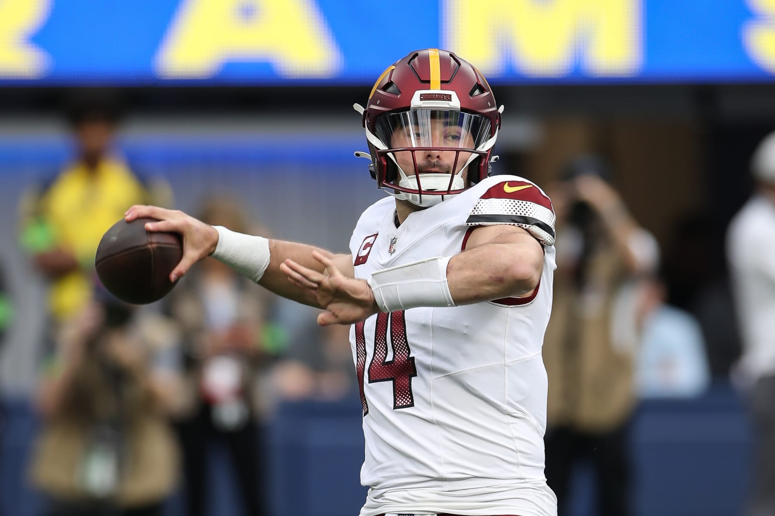 INGLEWOOD, CA - DECEMBER 17: Washington Commanders quarterback Sam Howell (14) passes during the NFL game between the Washington Commanders and the Los Angeles Rams on December 17, 2023, at SoFi Stadium in Inglewood, CA. (Photo by Jevone Moore/Icon Sportswire via Getty Images)
