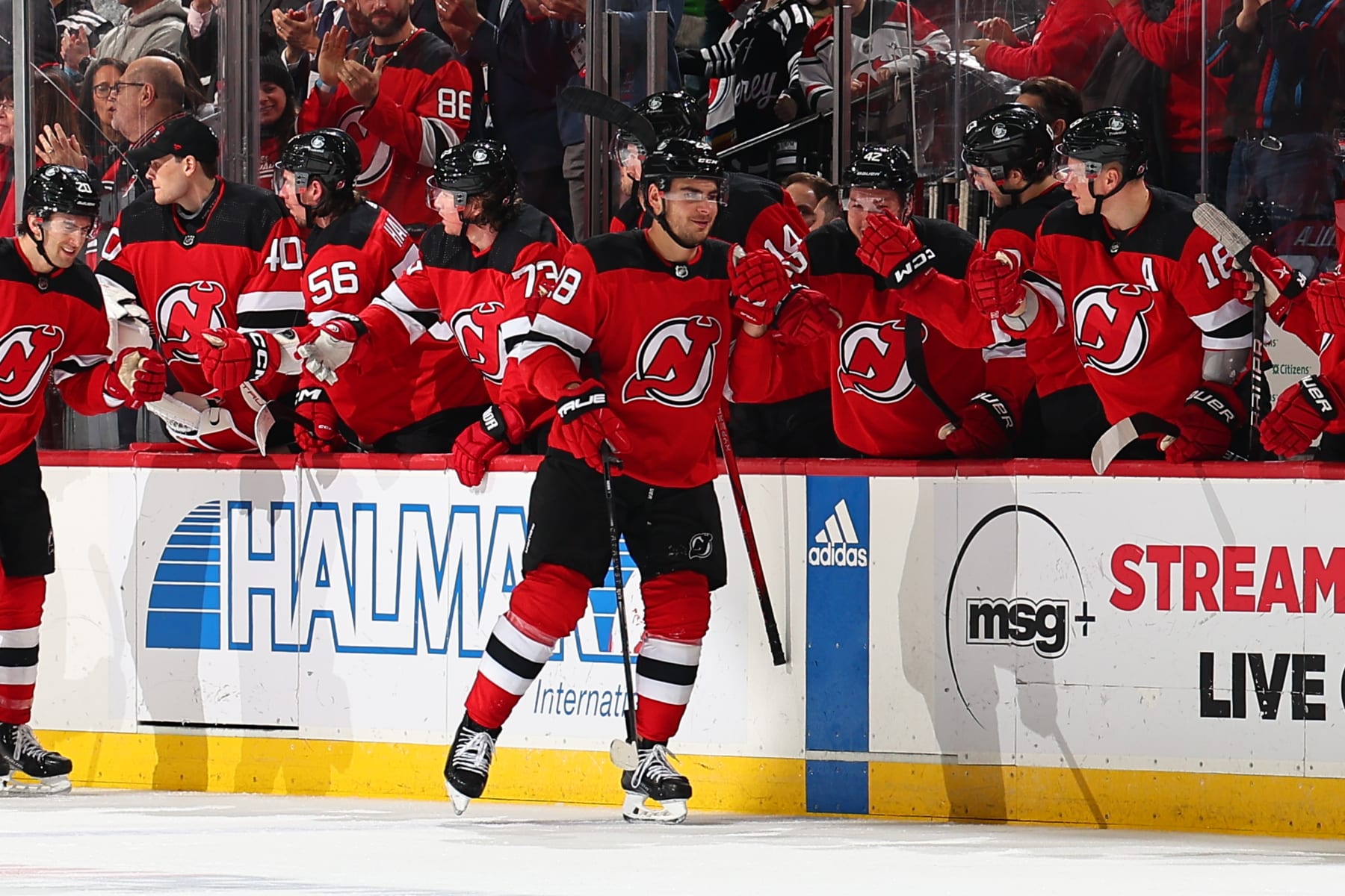 NEWARK, NJ - DECEMBER 21: Timo Meier #28 of the New Jersey Devils celebrates his goal with the bench in the second period of the game against the Edmonton Oilers at the Prudential Center on December 21, 2023 in Newark, New Jersey.  (Photo by Rich Graessle/NHLI via Getty Images)