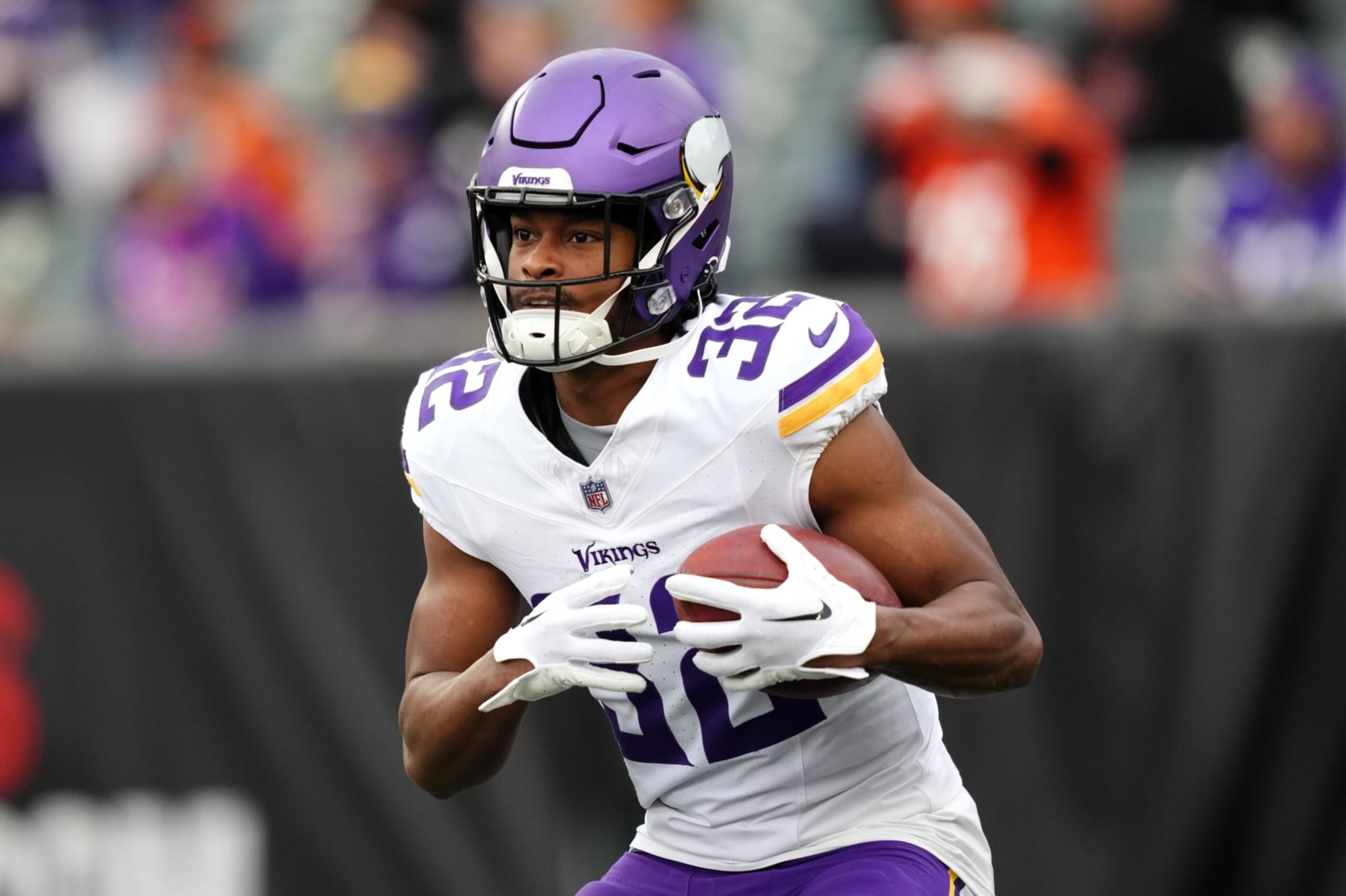 CINCINNATI, OHIO - DECEMBER 16: Ty Chandler #32 of the Minnesota Vikings warms up before the game against the Cincinnati Bengals at Paycor Stadium on December 16, 2023 in Cincinnati, Ohio. (Photo by Dylan Buell/Getty Images)