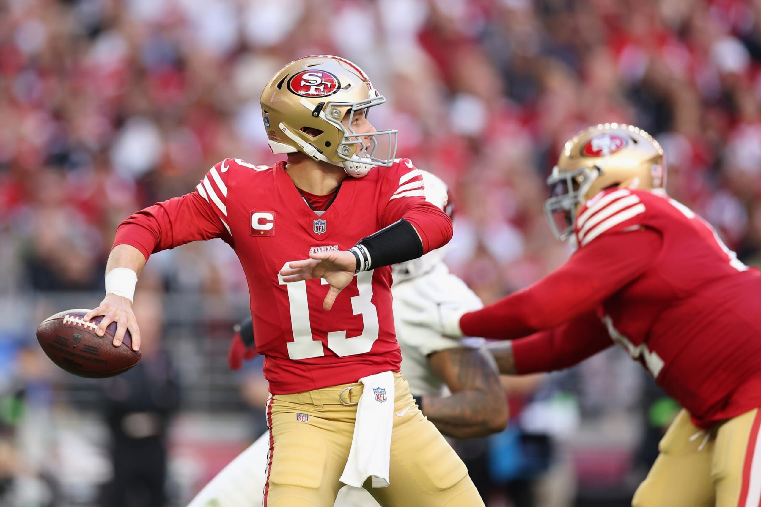 GLENDALE, ARIZONA - DECEMBER 17: Quarterback Brock Purdy #13 of the San Francisco 49ers drops back to pass during the NFL game at State Farm Stadium on December 17, 2023 in Glendale, Arizona. The 49ers defeated the Cardinals 45-29.  (Photo by Christian Petersen/Getty Images)
