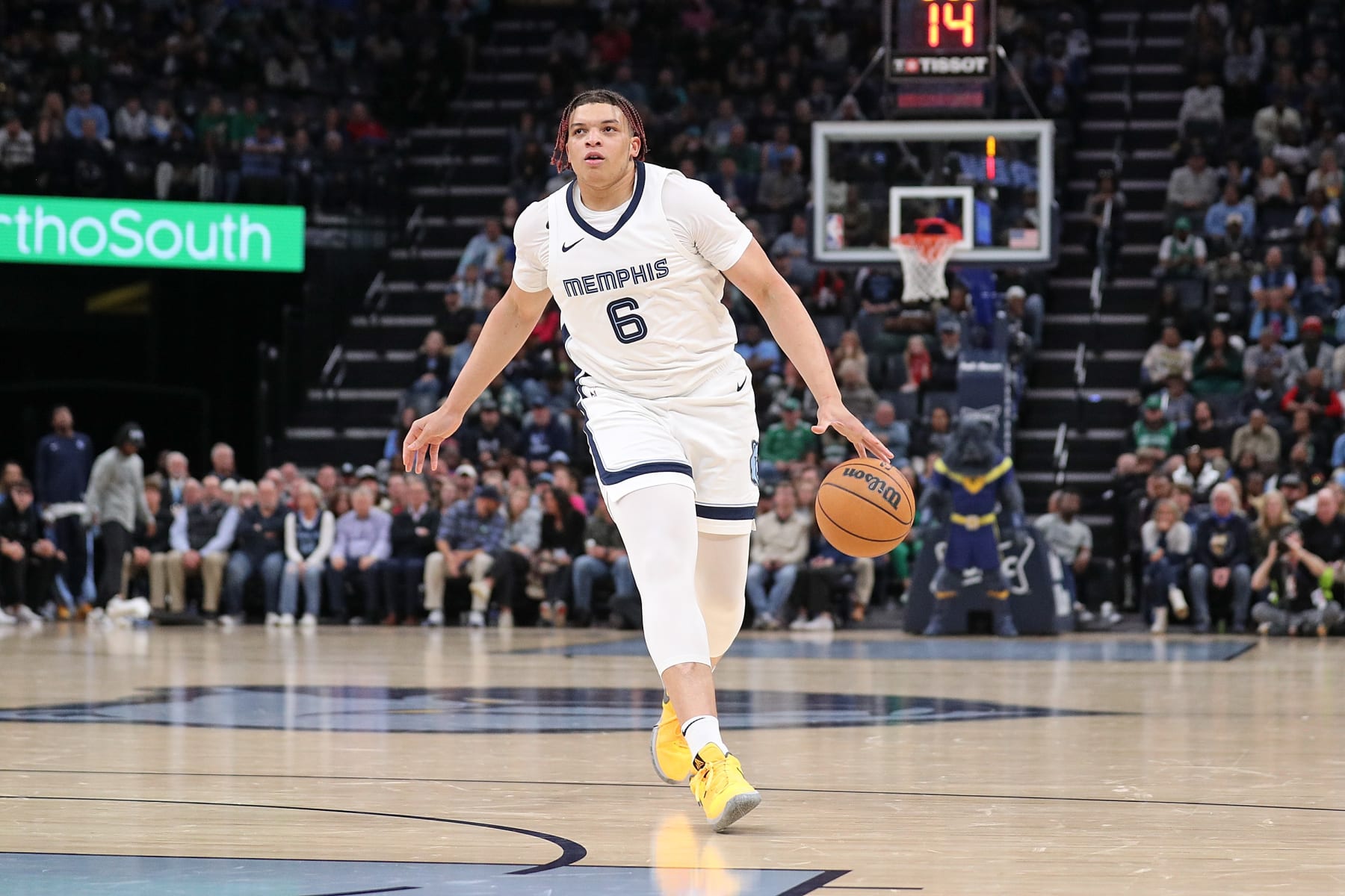 MEMPHIS, TENNESSEE - NOVEMBER 19: Kenneth Lofton Jr. #6 of the Memphis Grizzlies handles the ball during the game against the Boston Celtics at FedExForum on November 19, 2023 in Memphis, Tennessee. NOTE TO USER: User expressly acknowledges and agrees that, by downloading and or using this photograph, User is consenting to the terms and conditions of the Getty Images License Agreement.  (Photo by Justin Ford/Getty Images)