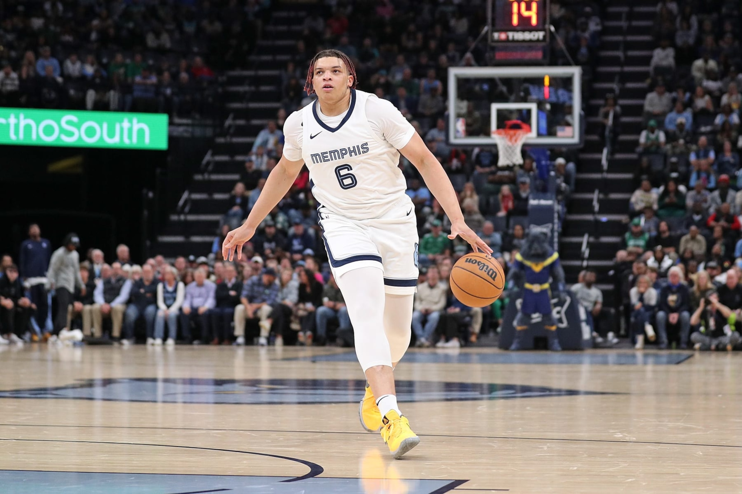 MEMPHIS, TENNESSEE - NOVEMBER 19: Kenneth Lofton Jr. #6 of the Memphis Grizzlies handles the ball during the game against the Boston Celtics at FedExForum on November 19, 2023 in Memphis, Tennessee. NOTE TO USER: User expressly acknowledges and agrees that, by downloading and or using this photograph, User is consenting to the terms and conditions of the Getty Images License Agreement.  (Photo by Justin Ford/Getty Images)