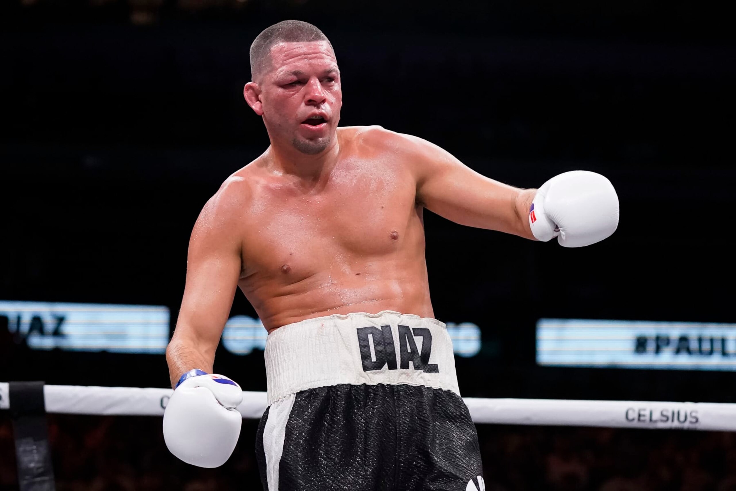 DALLAS, TEXAS - AUGUST 05: Nate Diaz attempts to regain his footing during the ninth round of his fight against Jake Paul at the American Airlines Center on August 05, 2023 in Dallas, Texas. (Photo by Sam Hodde/Getty Images)