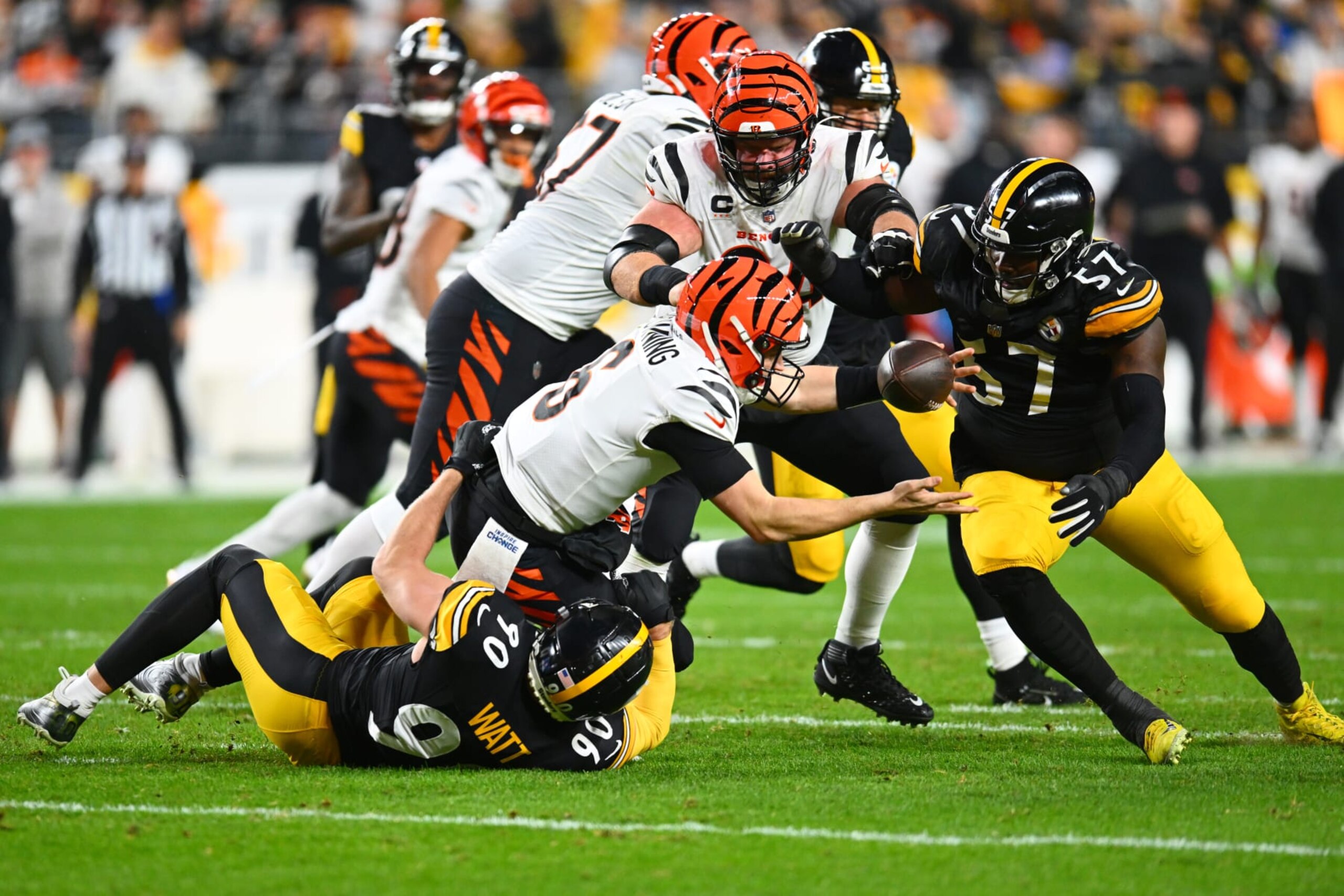 PITTSBURGH, PENNSYLVANIA - DECEMBER 23: T.J. Watt #90 of the Pittsburgh Steelers sacks Jake Browning #6 of the Cincinnati Bengals forcing him to fumble the ball during the second quarter of a game at Acrisure Stadium on December 23, 2023 in Pittsburgh, Pennsylvania. (Photo by Joe Sargent/Getty Images) PITTSBURGH, PENNSYLVANIA - DECEMBER 23: T.J. Watt #90 of the Pittsburgh Steelers sacks Jake Browning #6 of the Cincinnati Bengals forcing him to fumble the ball during the second quarter of a game at Acrisure Stadium on December 23, 2023 in Pittsburgh, Pennsylvania. (Photo by Joe Sargent/Getty Images)