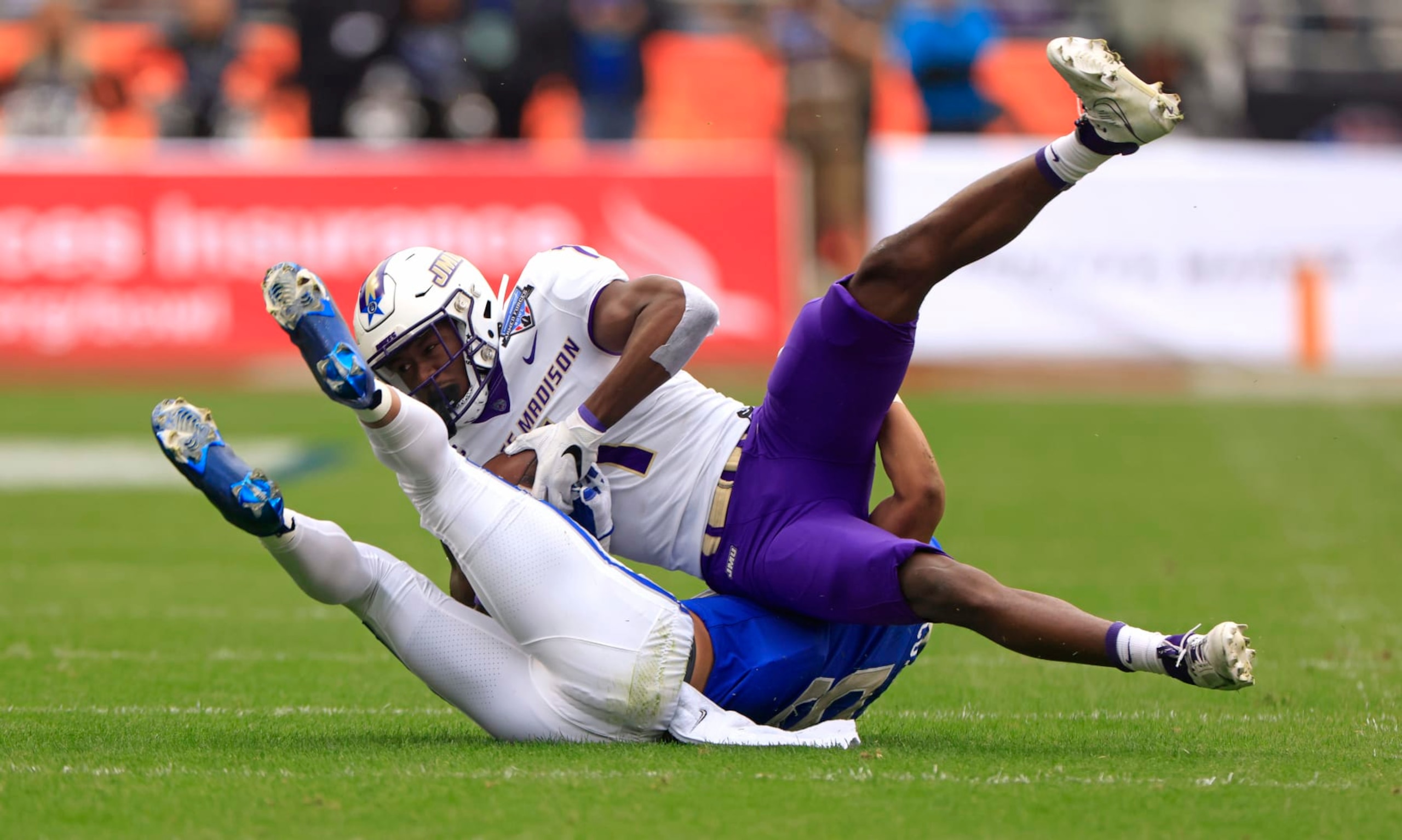 FORT WORTH, TX - DECEMBER 23: Wide receiver Reggie Brown #1 of the James Madison Dukes catches a pass for a first down against the Air Force Falcons in the first half of the Lockheed Martin Armed Forces Bowl at Amon G. Carter Stadium on December 23, 2023 in Fort Worth, Texas. (Photo by Ron Jenkins/Getty Images) FORT WORTH, TX - DECEMBER 23: Wide receiver Reggie Brown #1 of the James Madison Dukes catches a pass for a first down against the Air Force Falcons in the first half of the Lockheed Martin Armed Forces Bowl at Amon G. Carter Stadium on December 23, 2023 in Fort Worth, Texas. (Photo by Ron Jenkins/Getty Images)