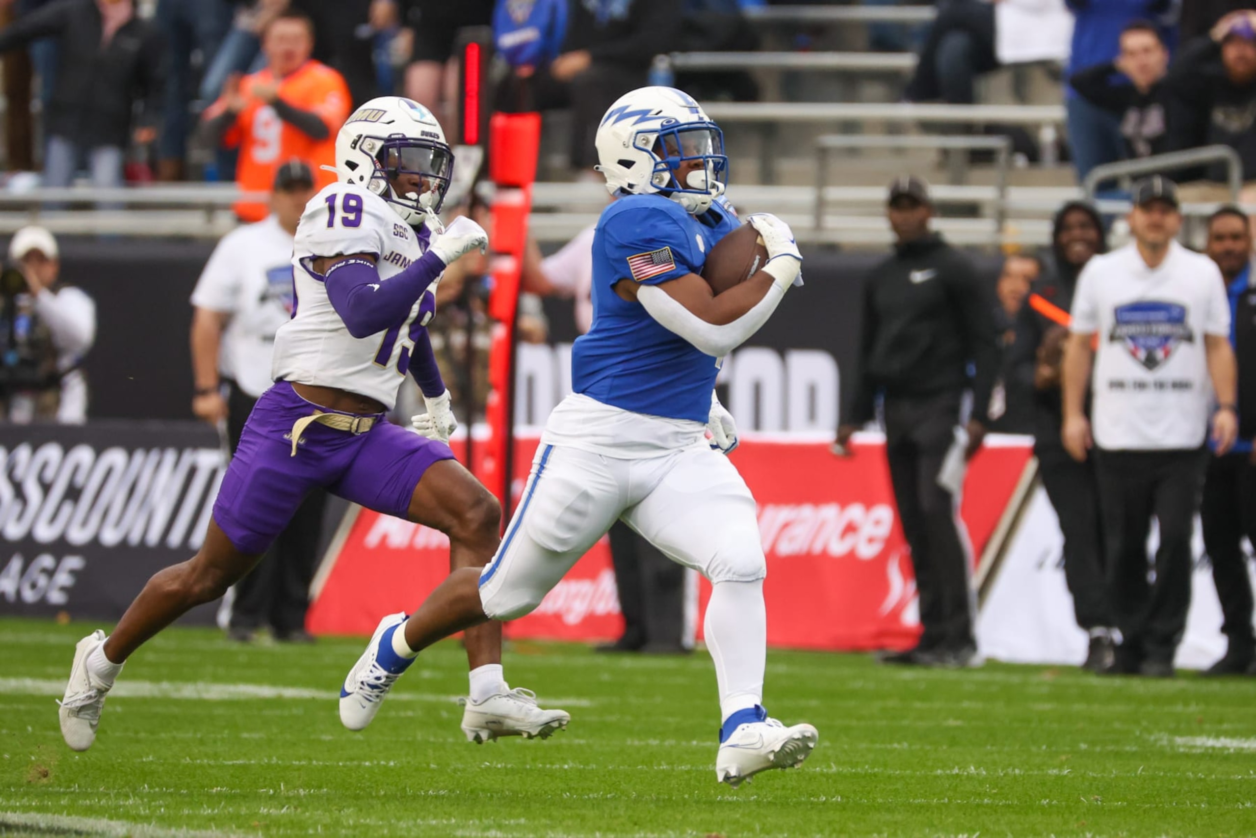 FORT WORTH, TX - DECEMBER 23: Air Force Falcons fullback Emmanuel Michel (4) runs for a first down during the Lockheed Martin Armed Forces Bowl between the James Madison Dukes and the Air Force Falcons on December 23, 2023 at Amon G. Carter Stadium in Fort Worth, TX. (Photo by George Walker/Icon Sportswire via Getty Images) FORT WORTH, TX - DECEMBER 23: Air Force Falcons fullback Emmanuel Michel (4) runs for a first down during the Lockheed Martin Armed Forces Bowl between the James Madison Dukes and the Air Force Falcons on December 23, 2023 at Amon G. Carter Stadium in Fort Worth, TX. (Photo by George Walker/Icon Sportswire via Getty Images)