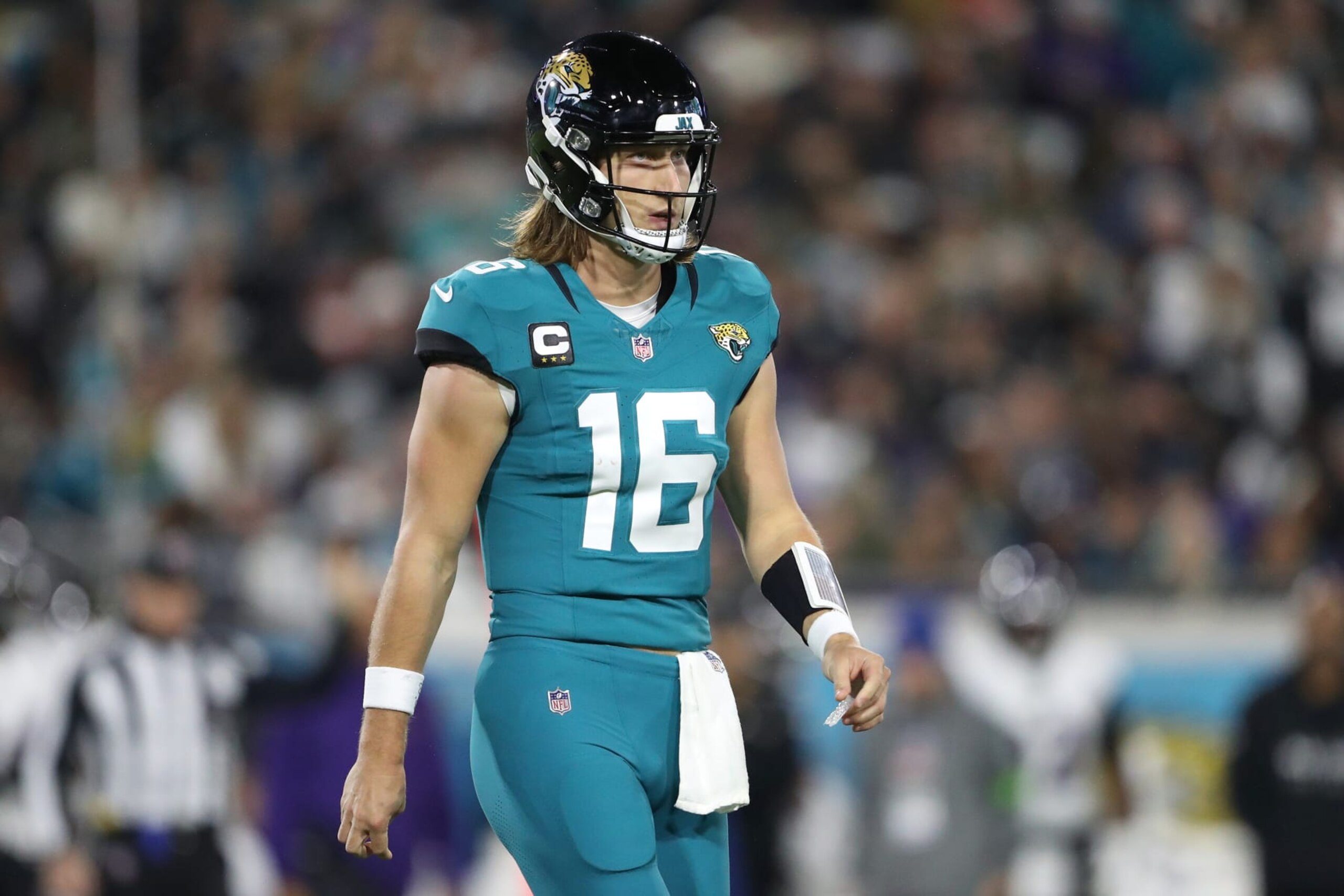 JACKSONVILLE, FLORIDA - DECEMBER 17: Trevor Lawrence #16 of the Jacksonville Jaguars in action during the first half of a game against the Baltimore Ravens at EverBank Stadium on December 17, 2023 in Jacksonville, Florida. (Photo by Courtney Culbreath/Getty Images) JACKSONVILLE, FLORIDA - DECEMBER 17: Trevor Lawrence #16 of the Jacksonville Jaguars in action during the first half of a game against the Baltimore Ravens at EverBank Stadium on December 17, 2023 in Jacksonville, Florida. (Photo by Courtney Culbreath/Getty Images)