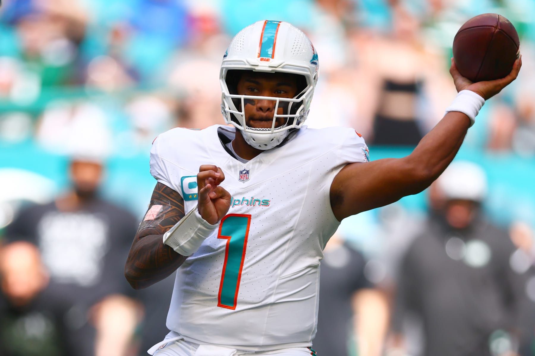 MIAMI GARDENS, FLORIDA - DECEMBER 17: Tua Tagovailoa #1 of the Miami Dolphins throws a pass against the New York Jets during the first half at Hard Rock Stadium on December 17, 2023 in Miami Gardens, Florida. (Photo by Megan Briggs/Getty Images)