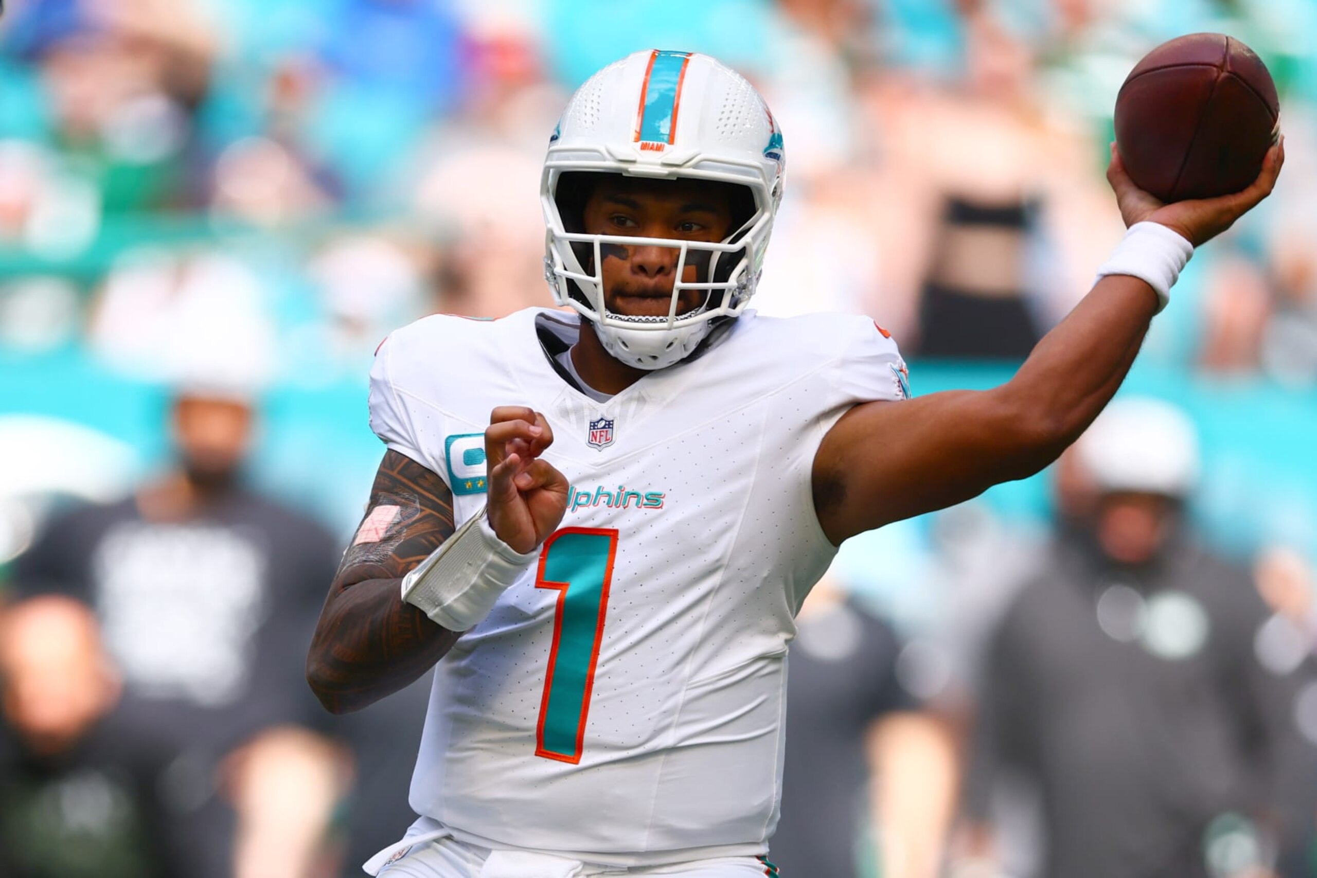 MIAMI GARDENS, FLORIDA - DECEMBER 17: Tua Tagovailoa #1 of the Miami Dolphins throws a pass against the New York Jets during the first half at Hard Rock Stadium on December 17, 2023 in Miami Gardens, Florida. (Photo by Megan Briggs/Getty Images)