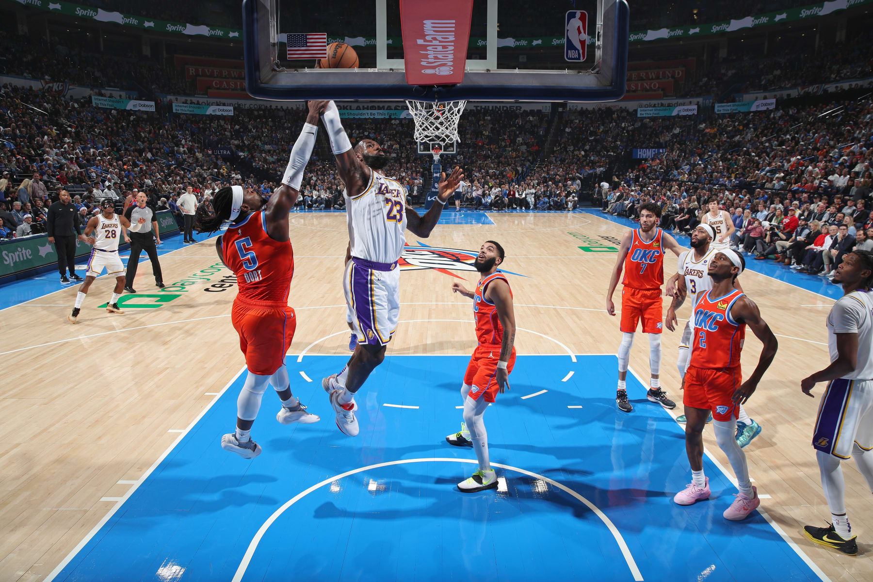 OKLAHOMA CITY, OK - DECEMBER 23: LeBron James #23 of the Los Angeles Lakers dunks the ball during the game against the Oklahoma City Thunder on December 23, 2023 at Paycom Arena in Oklahoma City, Oklahoma. NOTE TO USER: User expressly acknowledges and agrees that, by downloading and or using this photograph, User is consenting to the terms and conditions of the Getty Images License Agreement. Mandatory Copyright Notice: Copyright 2023 NBAE (Photo by Zach Beeker/NBAE via Getty Images)