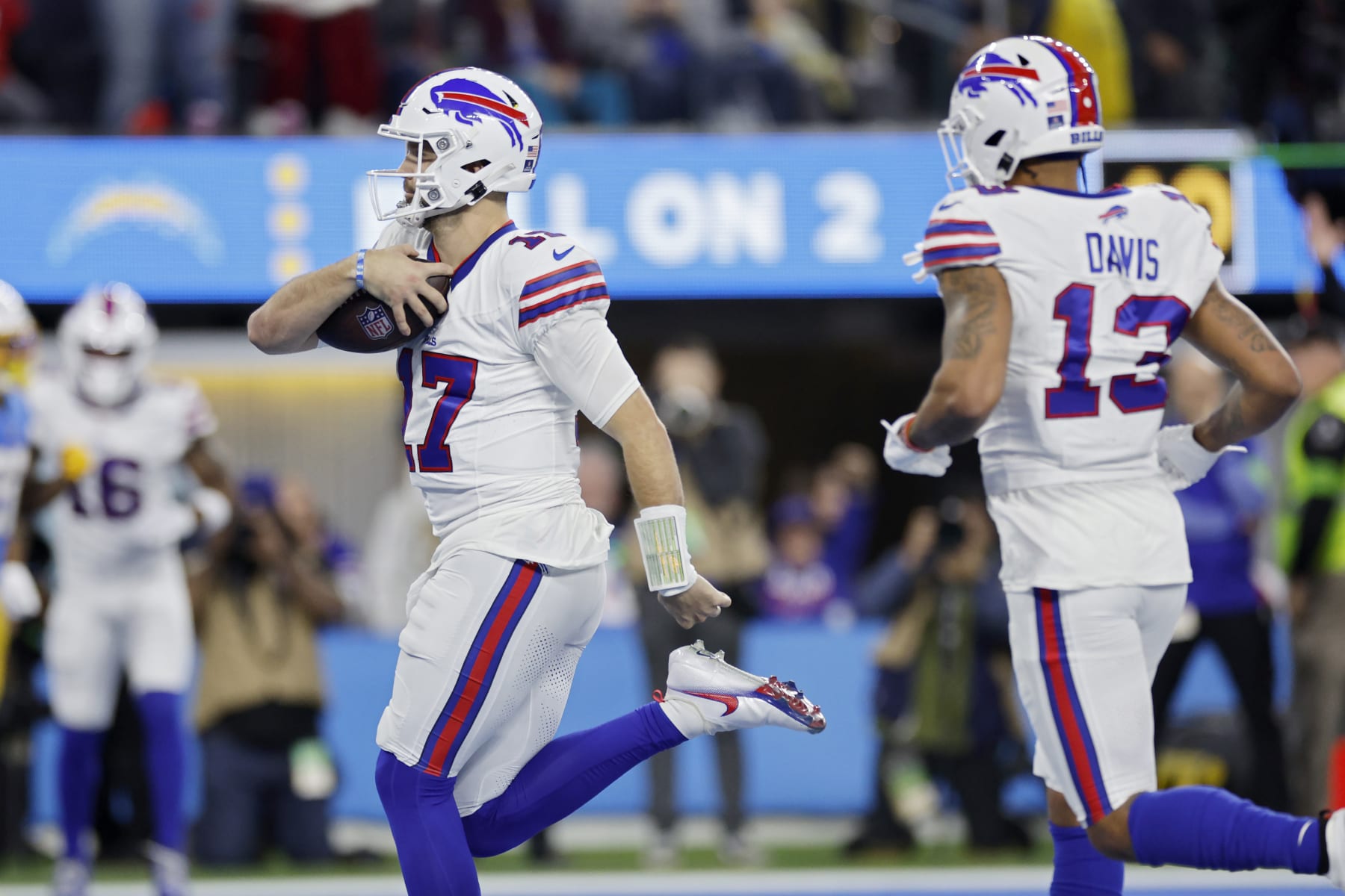 INGLEWOOD, CALIFORNIA - DECEMBER 23: Josh Allen #17 of the Buffalo Bills scores a touchdown in the third quarter against the Los Angeles Chargers at SoFi Stadium on December 23, 2023 in Inglewood, California. (Photo by Kevork Djansezian/Getty Images)