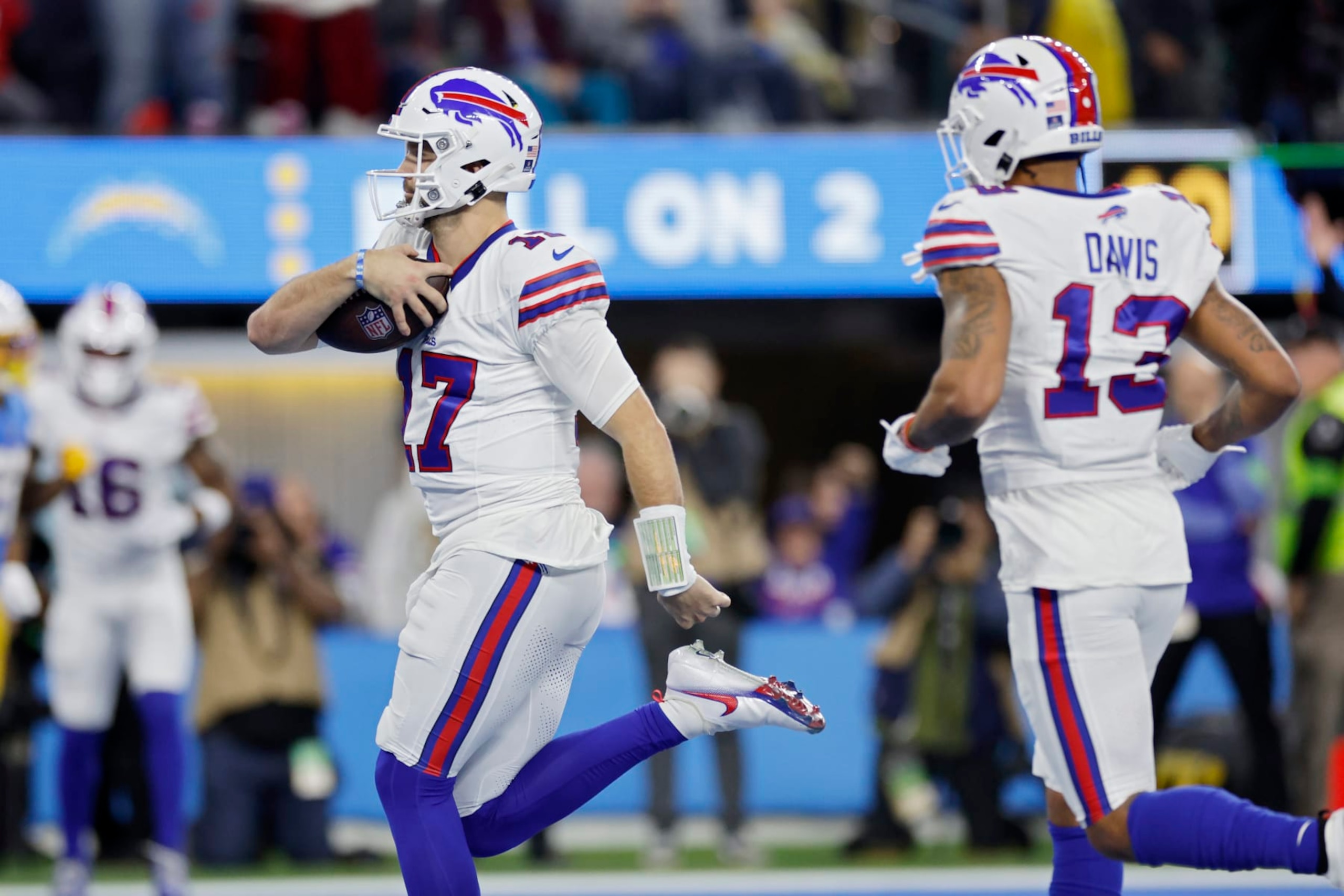 INGLEWOOD, CALIFORNIA - DECEMBER 23: Josh Allen #17 of the Buffalo Bills scores a touchdown in the third quarter against the Los Angeles Chargers at SoFi Stadium on December 23, 2023 in Inglewood, California. (Photo by Kevork Djansezian/Getty Images)