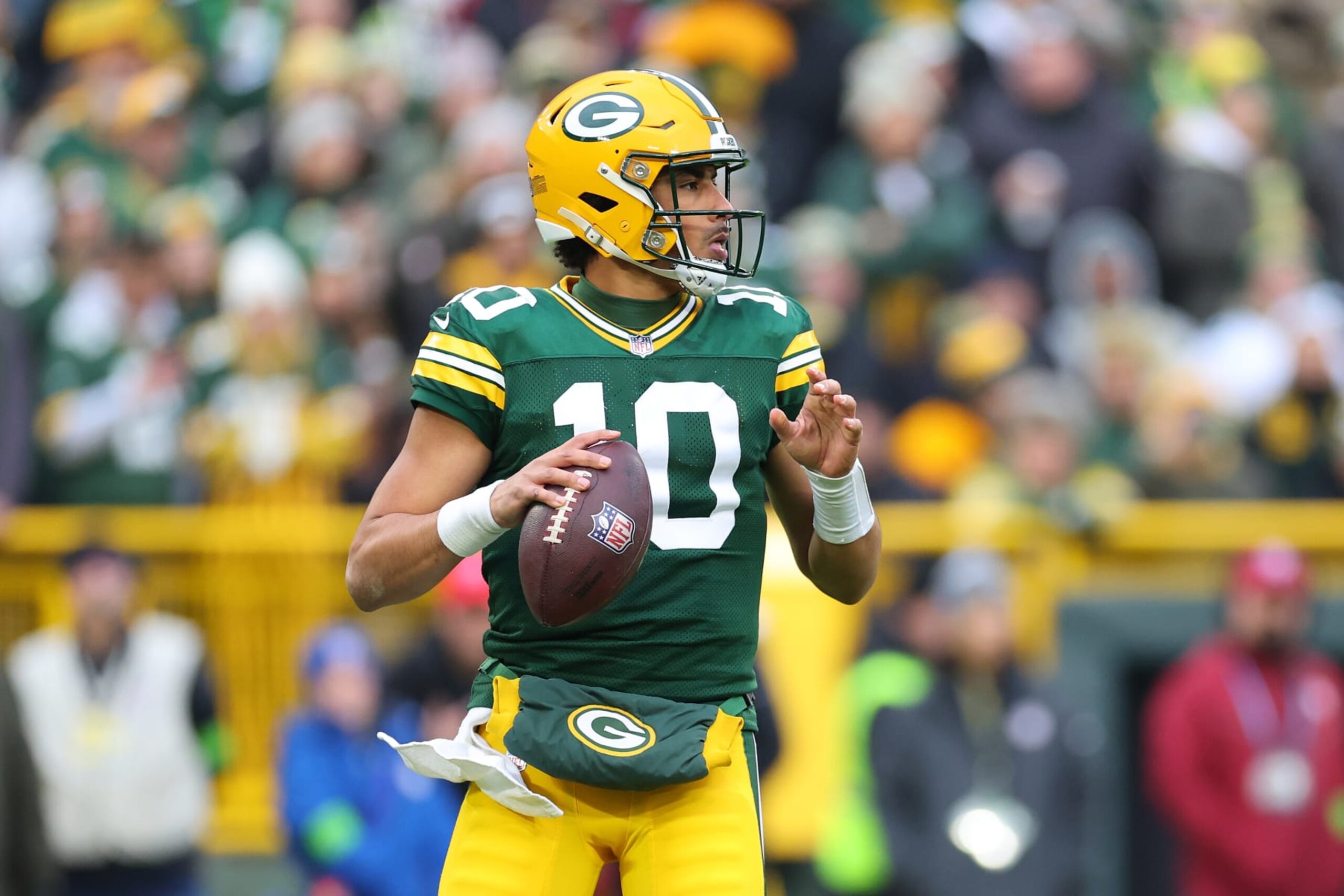 GREEN BAY, WISCONSIN - DECEMBER 17: Jordan Love #10 of the Green Bay Packers looks to pass during a game against the Tampa Bay Buccaneers at Lambeau Field on December 17, 2023 in Green Bay, Wisconsin. The Buccaneers defeated the Packers 34-20. (Photo by Stacy Revere/Getty Images) GREEN BAY, WISCONSIN - DECEMBER 17: Jordan Love #10 of the Green Bay Packers looks to pass during a game against the Tampa Bay Buccaneers at Lambeau Field on December 17, 2023 in Green Bay, Wisconsin. The Buccaneers defeated the Packers 34-20. (Photo by Stacy Revere/Getty Images)