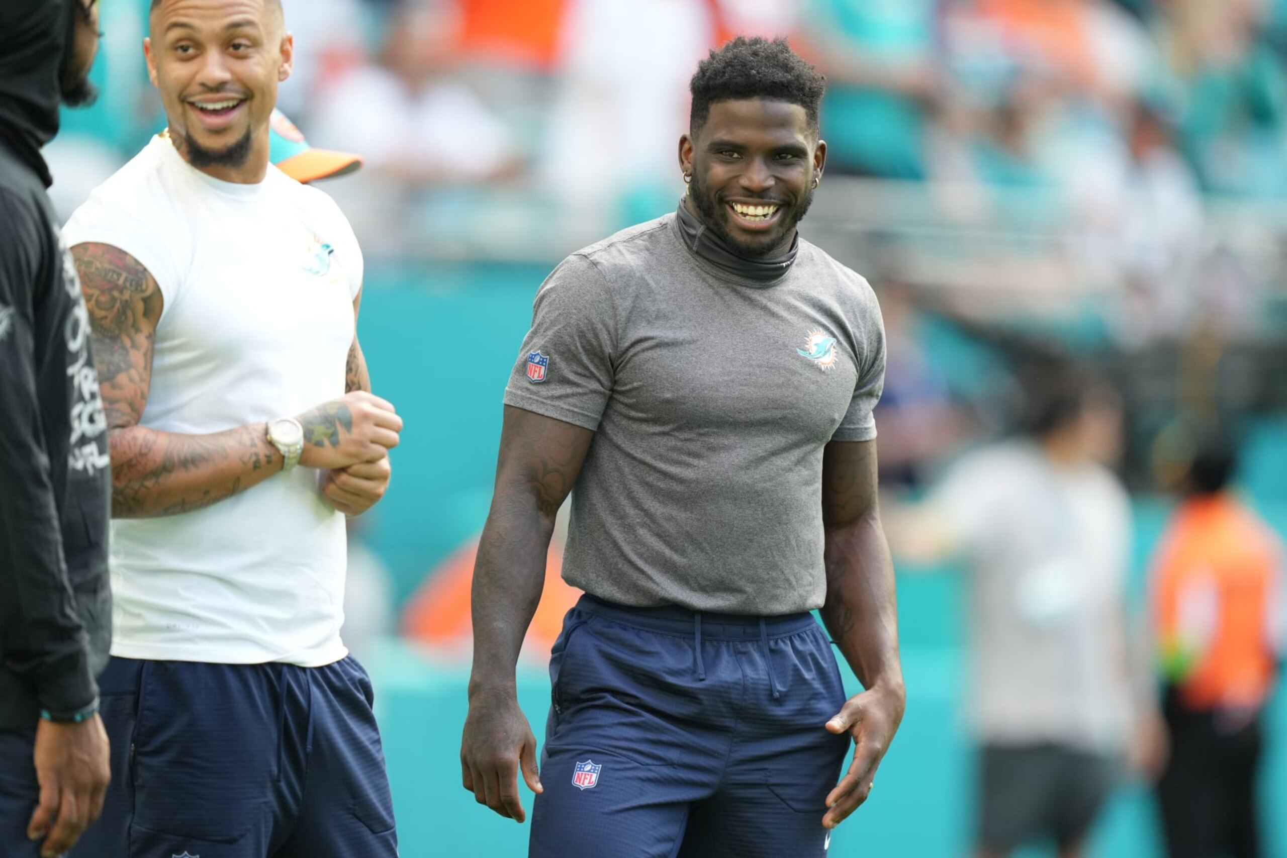 MIAMI GARDENS, FL - DECEMBER 17: Miami Dolphins wide receiver Tyreek Hill (10) laughs with teammates before the game between the New York Jets and the Miami Dolphins on Sunday, December 17, 2023 at Hard Rock Stadium, Hard Rock Stadium, Fla. (Photo by Peter Joneleit/Icon Sportswire via Getty Images) MIAMI GARDENS, FL - DECEMBER 17: Miami Dolphins wide receiver Tyreek Hill (10) laughs with teammates before the game between the New York Jets and the Miami Dolphins on Sunday, December 17, 2023 at Hard Rock Stadium, Hard Rock Stadium, Fla. (Photo by Peter Joneleit/Icon Sportswire via Getty Images)