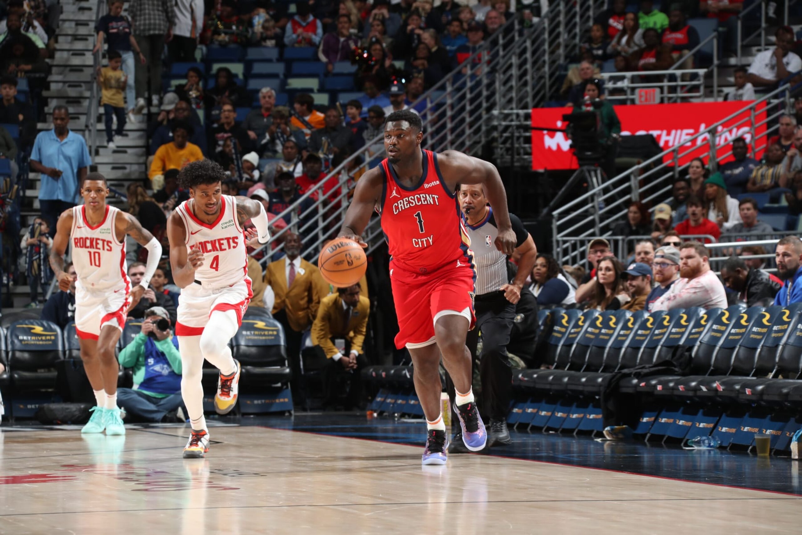 NEW ORLEANS, LA - DECEMBER 23: Zion Williamson #1 of the New Orleans Pelicans dribbles the ball during the game against the Houston Rockets on December 23, 2023 at the Smoothie King Center in New Orleans, Louisiana. NOTE TO USER: User expressly acknowledges and agrees that, by downloading and or using this Photograph, user is consenting to the terms and conditions of the Getty Images License Agreement. Mandatory Copyright Notice: Copyright 2023 NBAE (Photo by Layne Murdoch Jr./NBAE via Getty Images)
