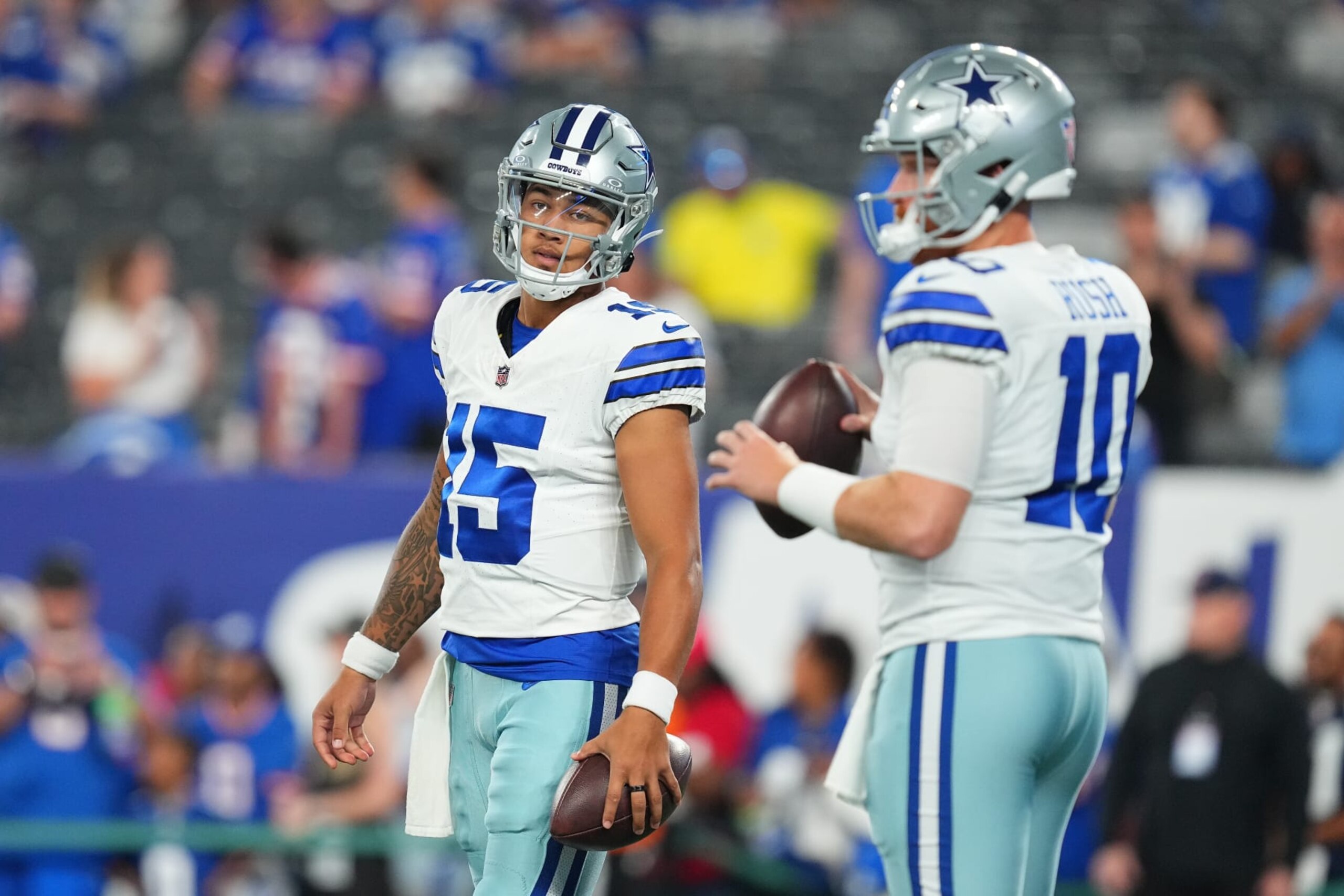 EAST RUTHERFORD, NEW JERSEY - SEPTEMBER 10: Trey Lance #15 and Cooper Rush #10 of the Dallas Cowboys look on against the New York Giants at MetLife Stadium on September 10, 2023 in East Rutherford, New Jersey. (Photo by Mitchell Leff/Getty Images)