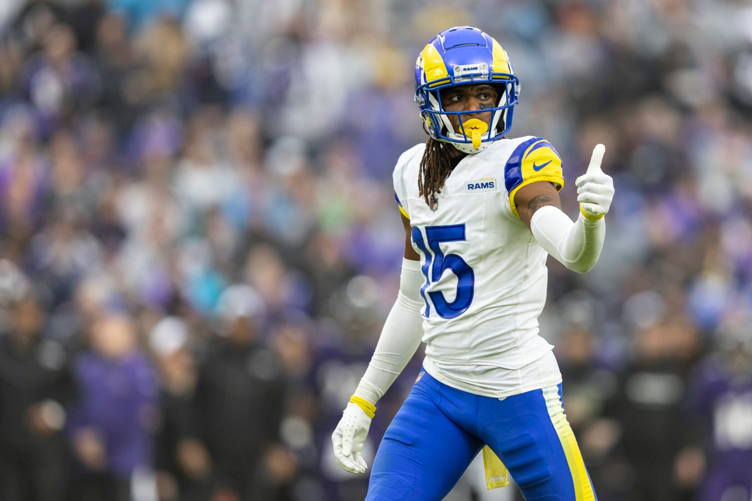 BALTIMORE, MARYLAND - DECEMBER 10: Demarcus Robinson #15 of the Los Angeles Rams signals as he lines up during an NFL football game between the Baltimore Ravens and the Los Angeles Rams at M&T Bank Stadium on December 10, 2023 in Baltimore, Maryland. (Photo by Michael Owens/Getty Images)